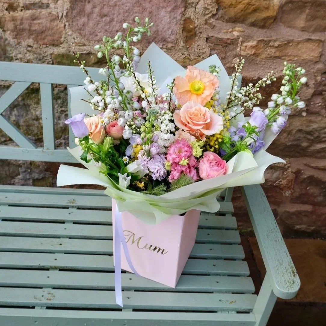 Blossoming-blooms-mother%27s-day-bouquet-with-personalised-box-wrapped-in-pale-green-florist-east-lothian.jpg