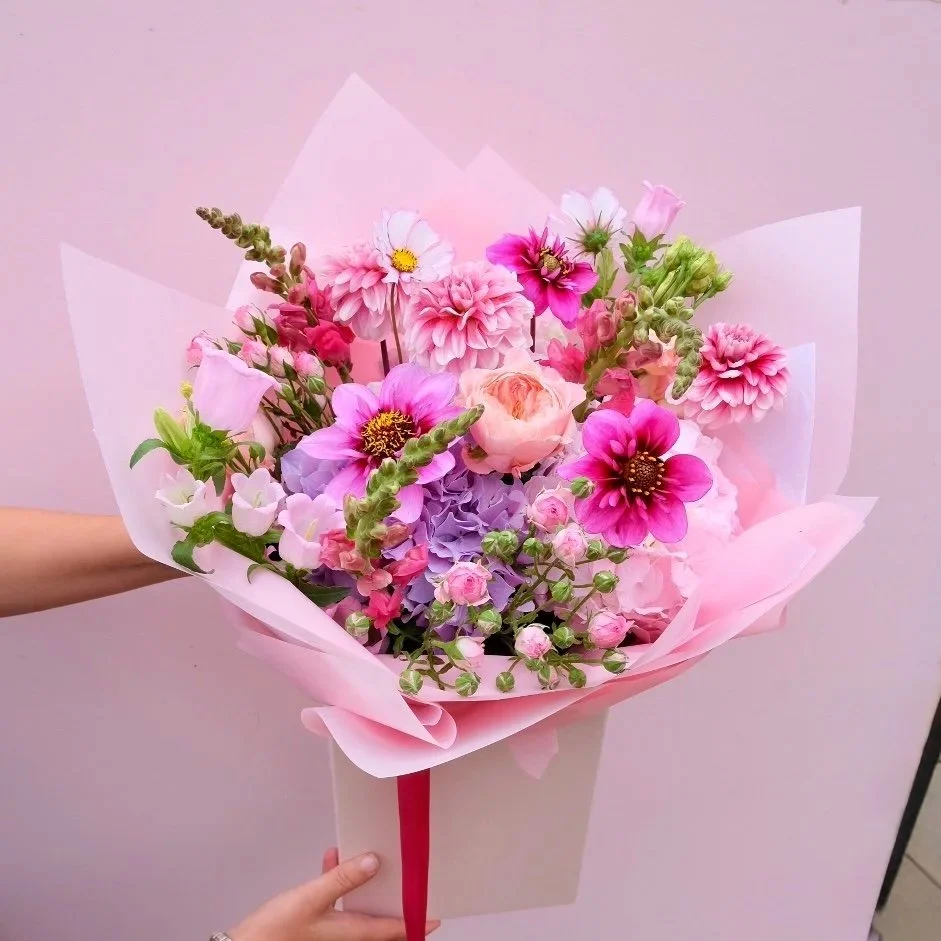 summer-pastels-bouquet-including-dahlias-and-hydrangea-and-other-blooms-in-a-box.jpg
