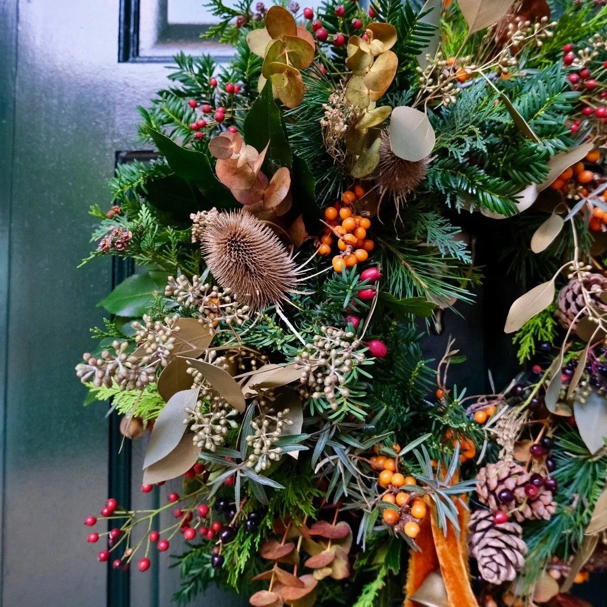 close-up-of-golden-fresh-christmas-door-wreth-east-lothian.jpg
