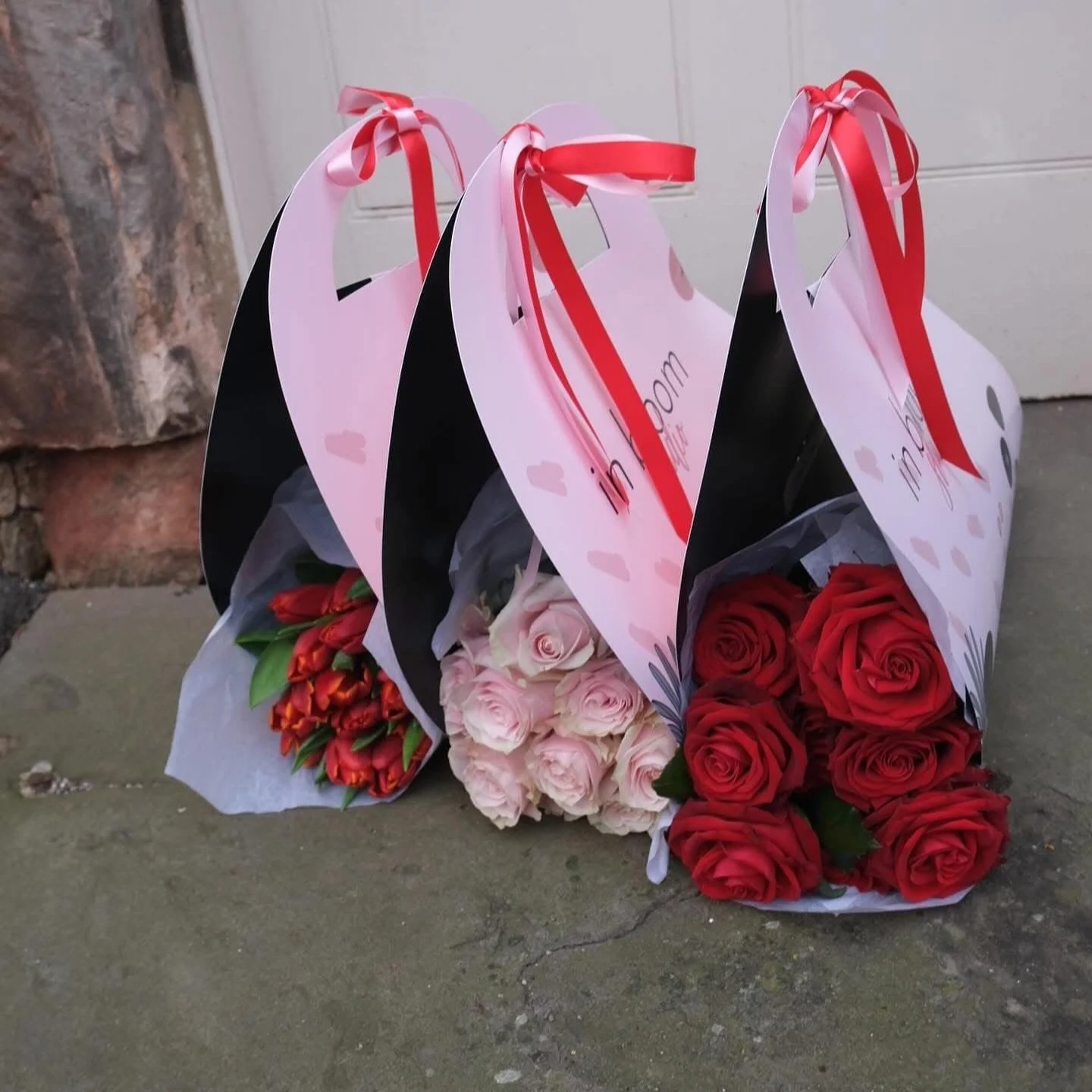 Red and pink roses, or tulips in sustainable packaging valentine's day edinburgh