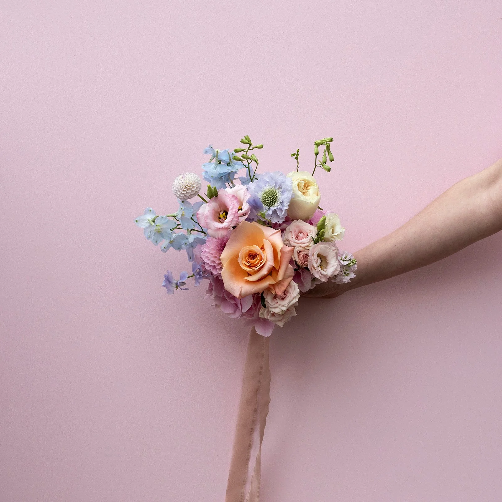 pastel-coloured-bridesmaid-fresh-flower-bouquet-with-silk-ribbon.jpg