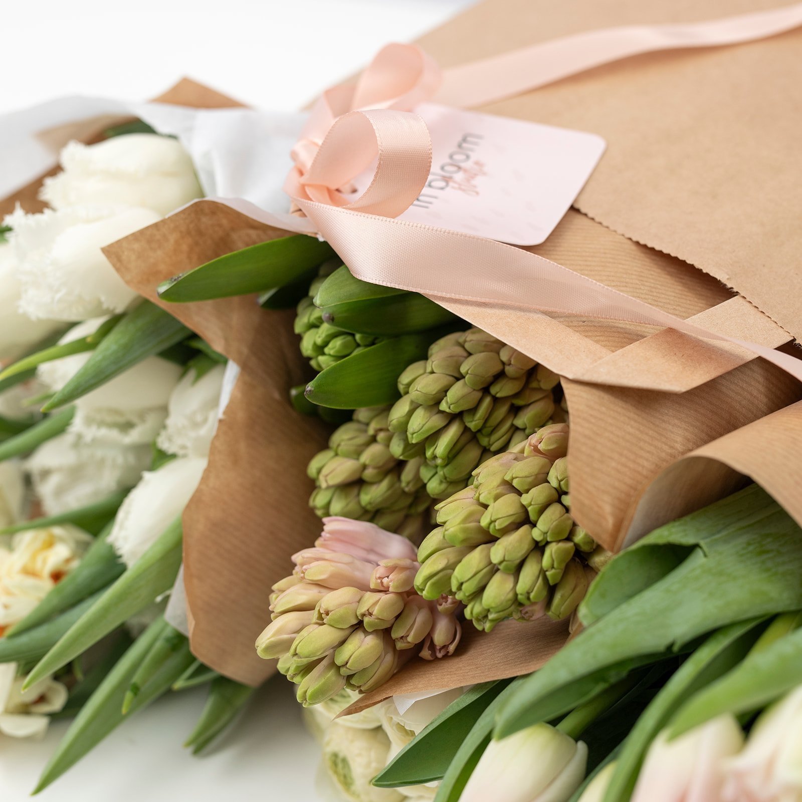 close up of floral bunch Tulips, Hyacinths, Paper whites and Ranunculus