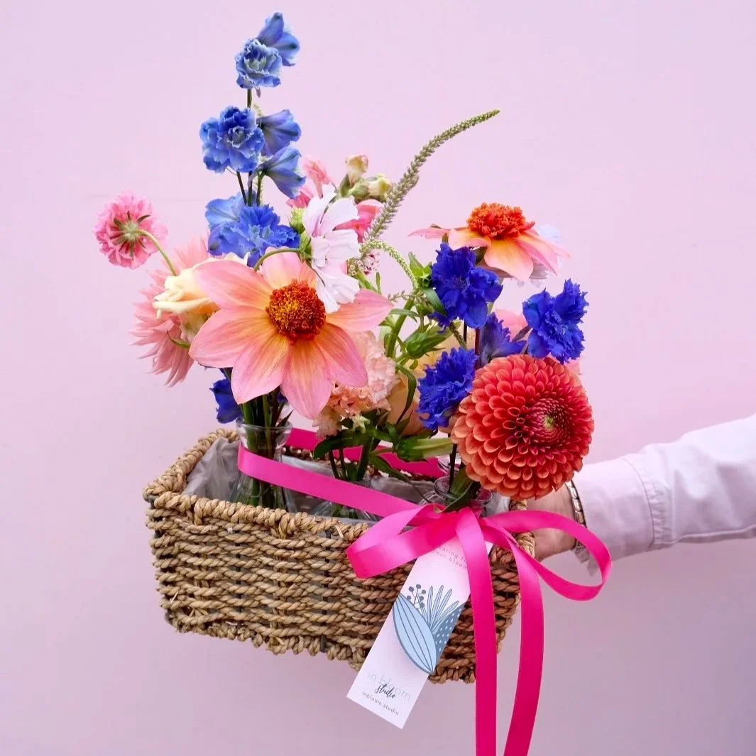 Bloomin-basket-of-buds-tied-with-ribbon-available-for-delivery-across-east-lothian-and-edinburgh.jpg