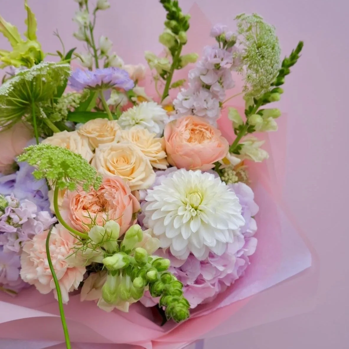 peach-melba-flower-bouquet-in-bloom-florist-delivering-local-and-collection-wrapped-in-pale-pink.jpg