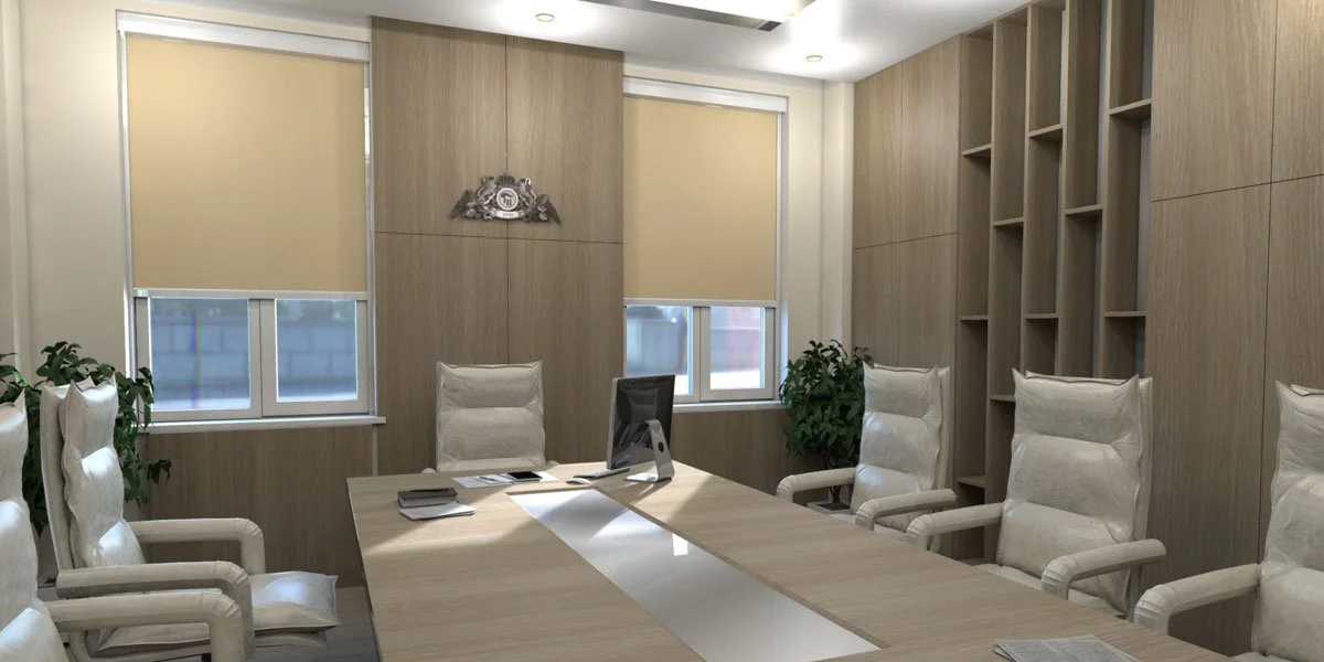 Modern conference room with a long wooden table, six white high-backed chairs, a computer, books, green plants, and beige window blinds.