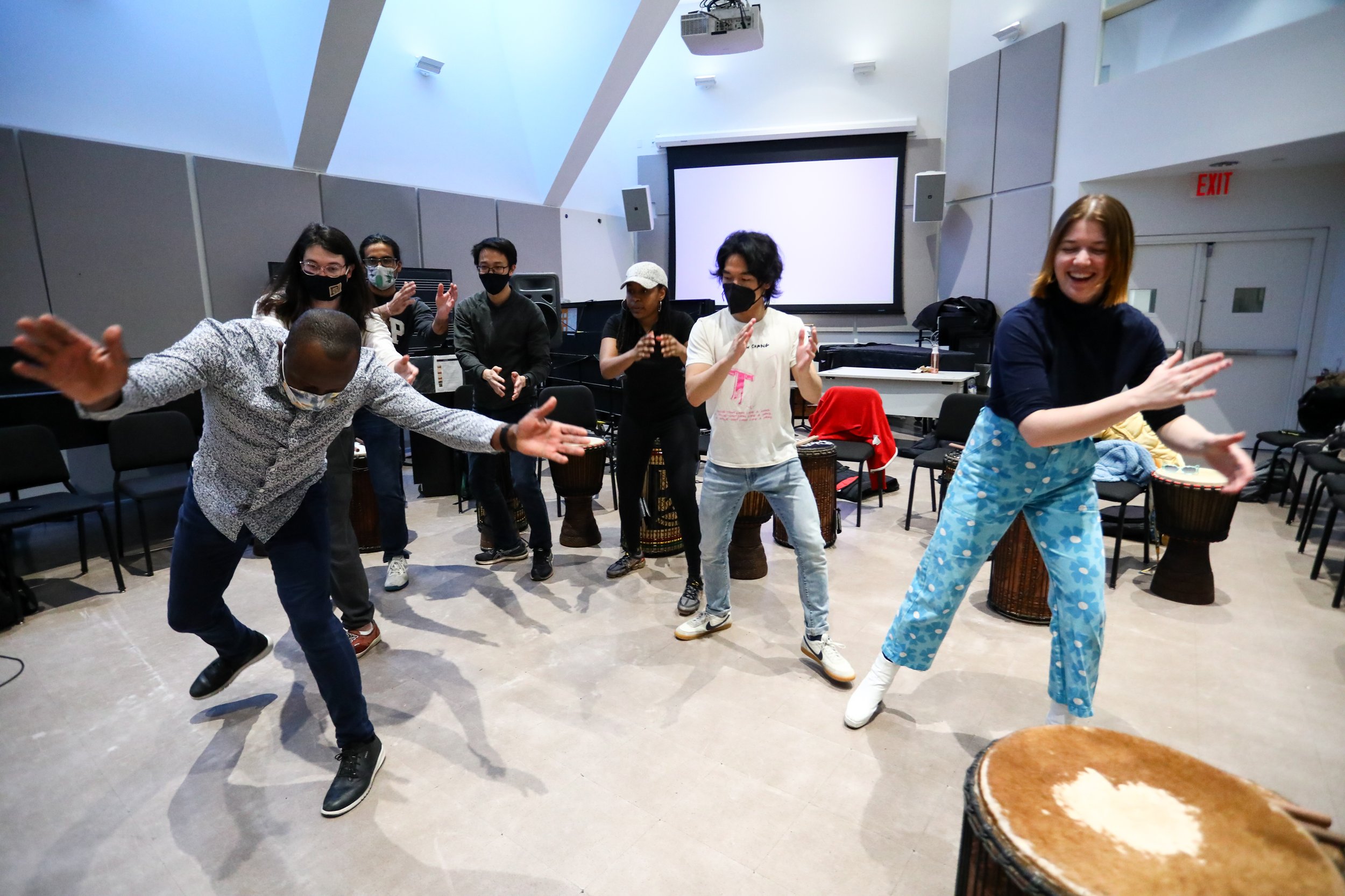 Olivier leads his students in a dance during rehearsal.