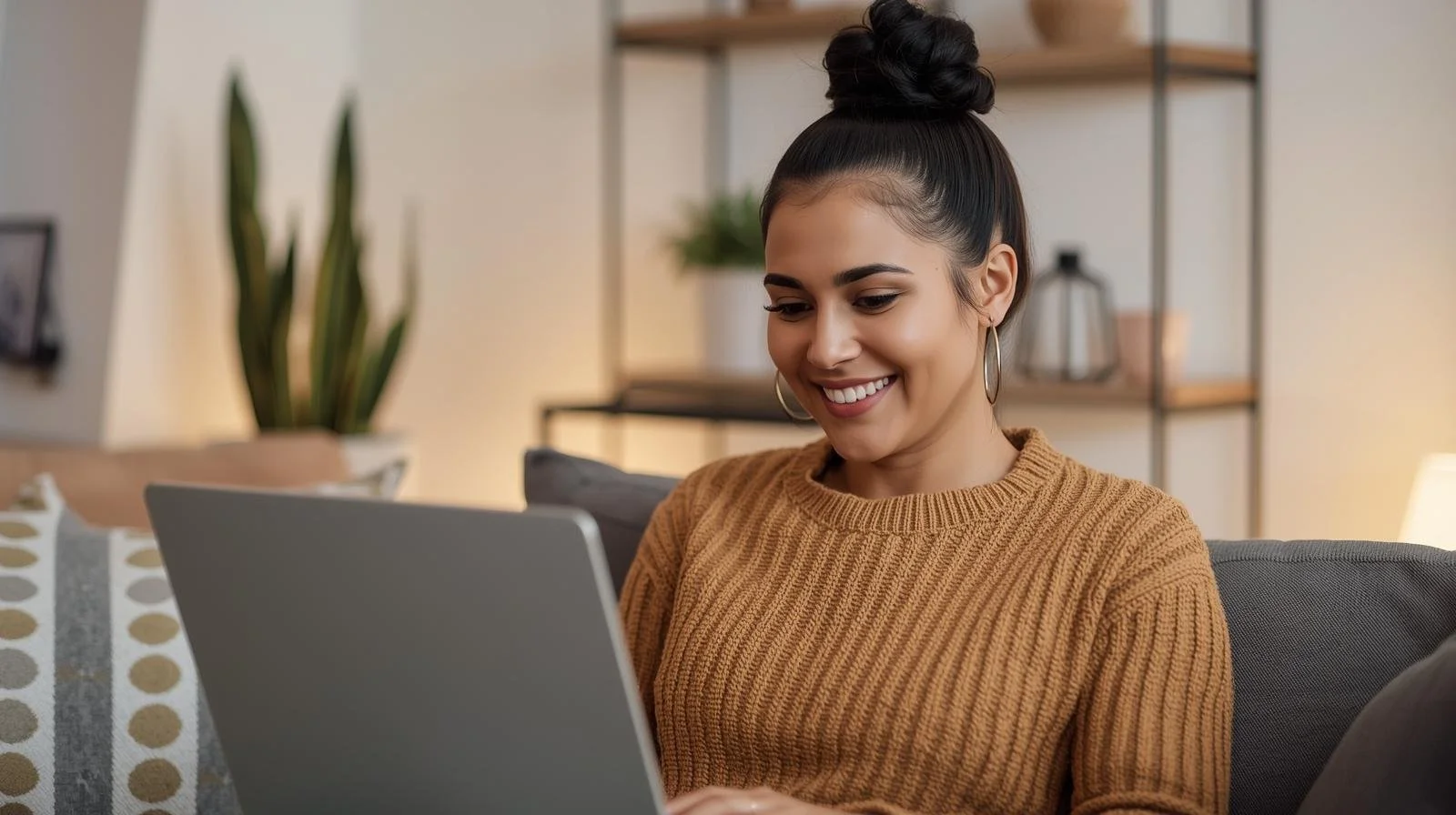 Hispanic woman smiling at home during virtual therapy for anxiety in Illinois