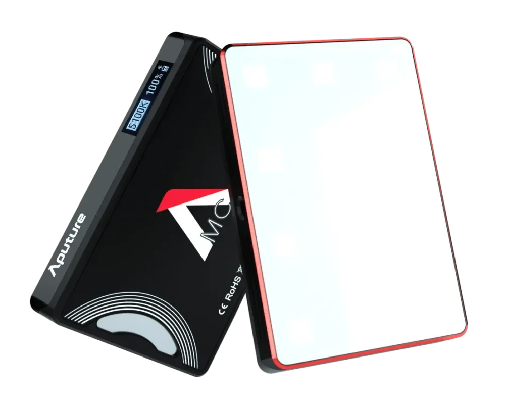LED light panel with black back and white front, placed next to a black and red portable power bank