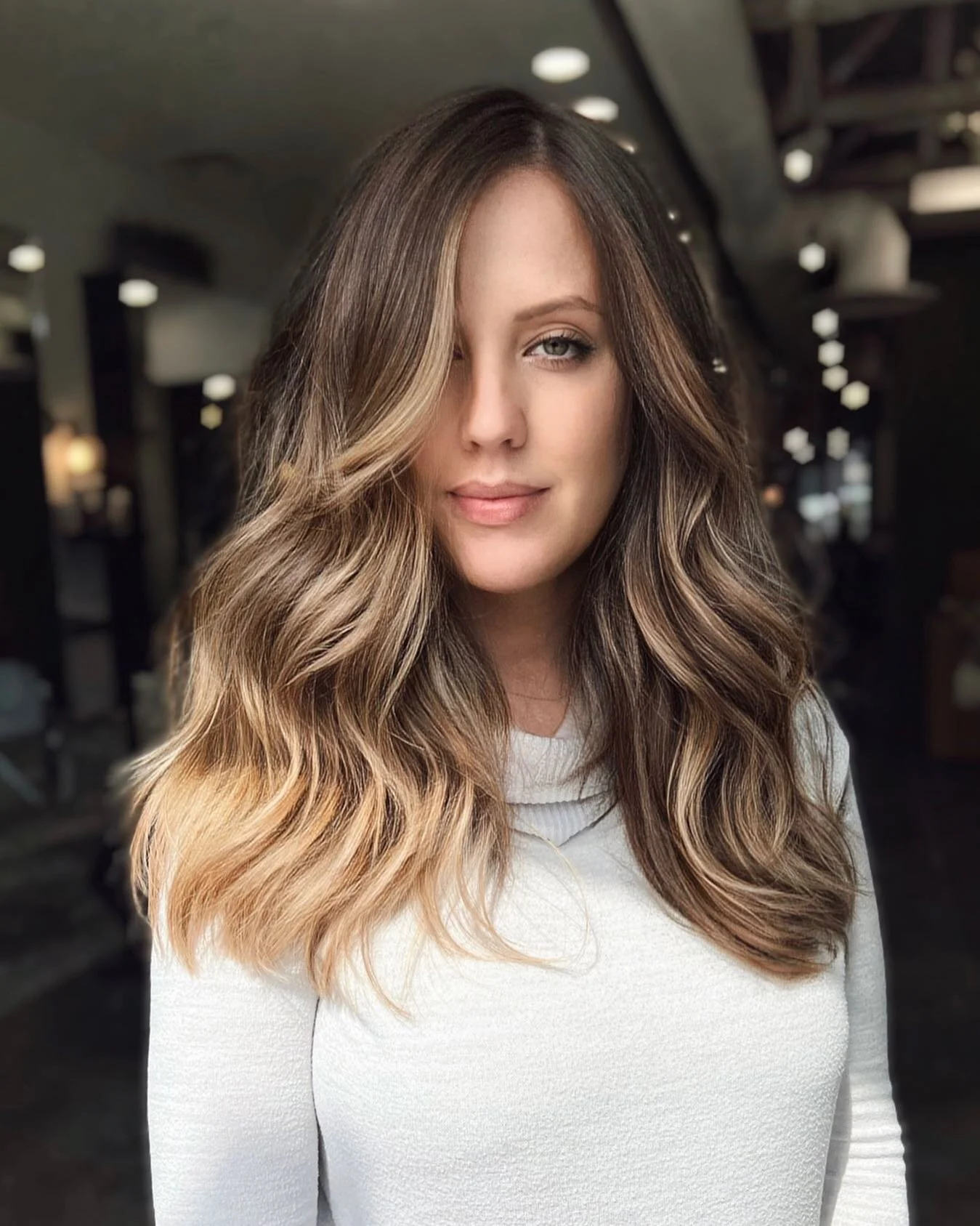 Golden hour + this sultry bronde ✨ I love the way cool and warm tones pop in different lighting. Colored melted using @redken 04nb + 05nw, glossed with 07nw + 08vg. So happy this beauty travelled across the border to see me. #grateful @thebeigelabel 