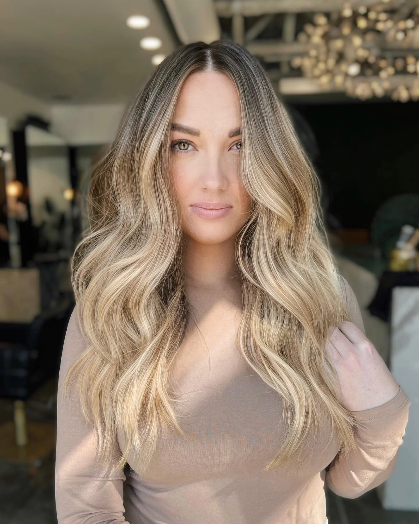 Creamy Vanilla 🍦 A blended balance of her natural depth and lifted highlights, paired with my contoured cut to bring openness and fullness around her face. You just know this will grow out like a dream with all that dimension at her base! #xotheERIN