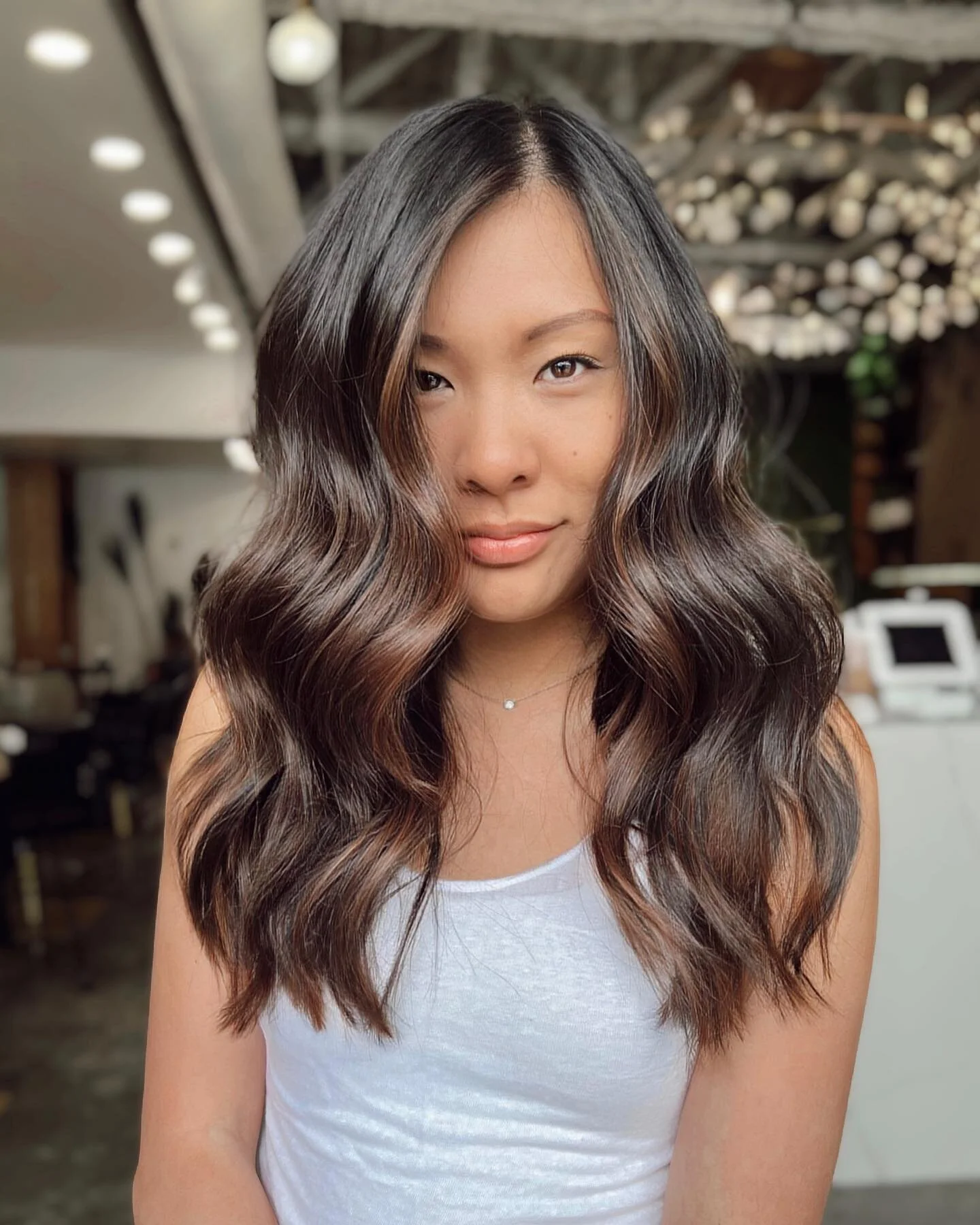 Warm, glossy, &ldquo;expensive brunettes&rdquo;&hellip; even in the summer ☀️🤎 This look is all freehand balayage painting, paired with @redken SEQ 09NW + 07CB for the richest, most complimentary tones on her palette. The shine SEQ gives is like no 