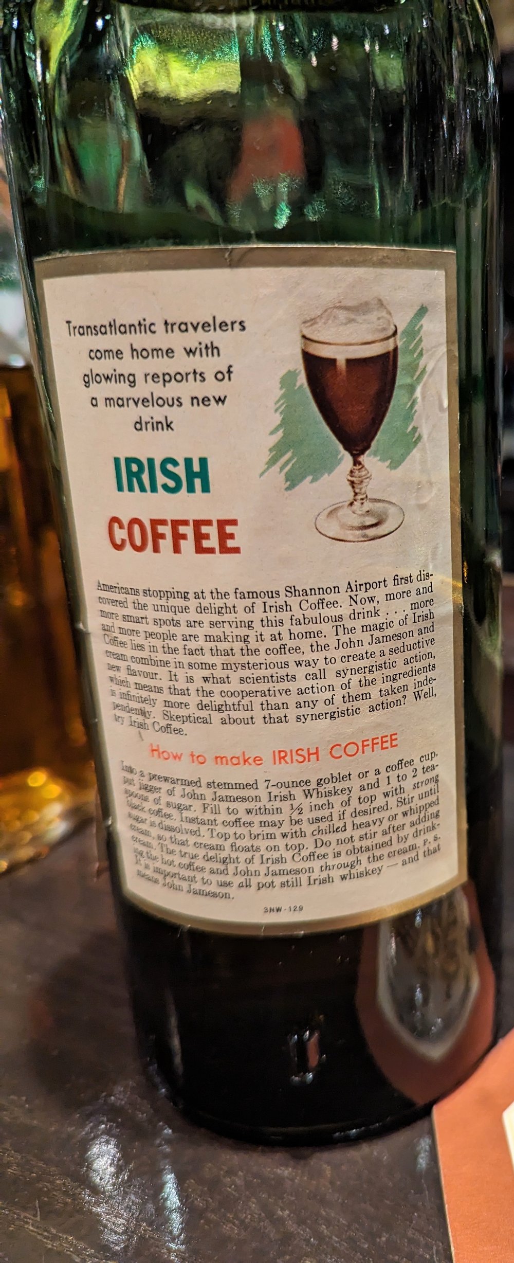 The back label of a 1950's Jameson Irish Whiskey bottle extolling the virtues of the Irish Coffee -  Chris Brown Photo.jpeg
