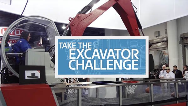 Eaton Excavator Challenge with excavator and visitor working to dunk a basketball
