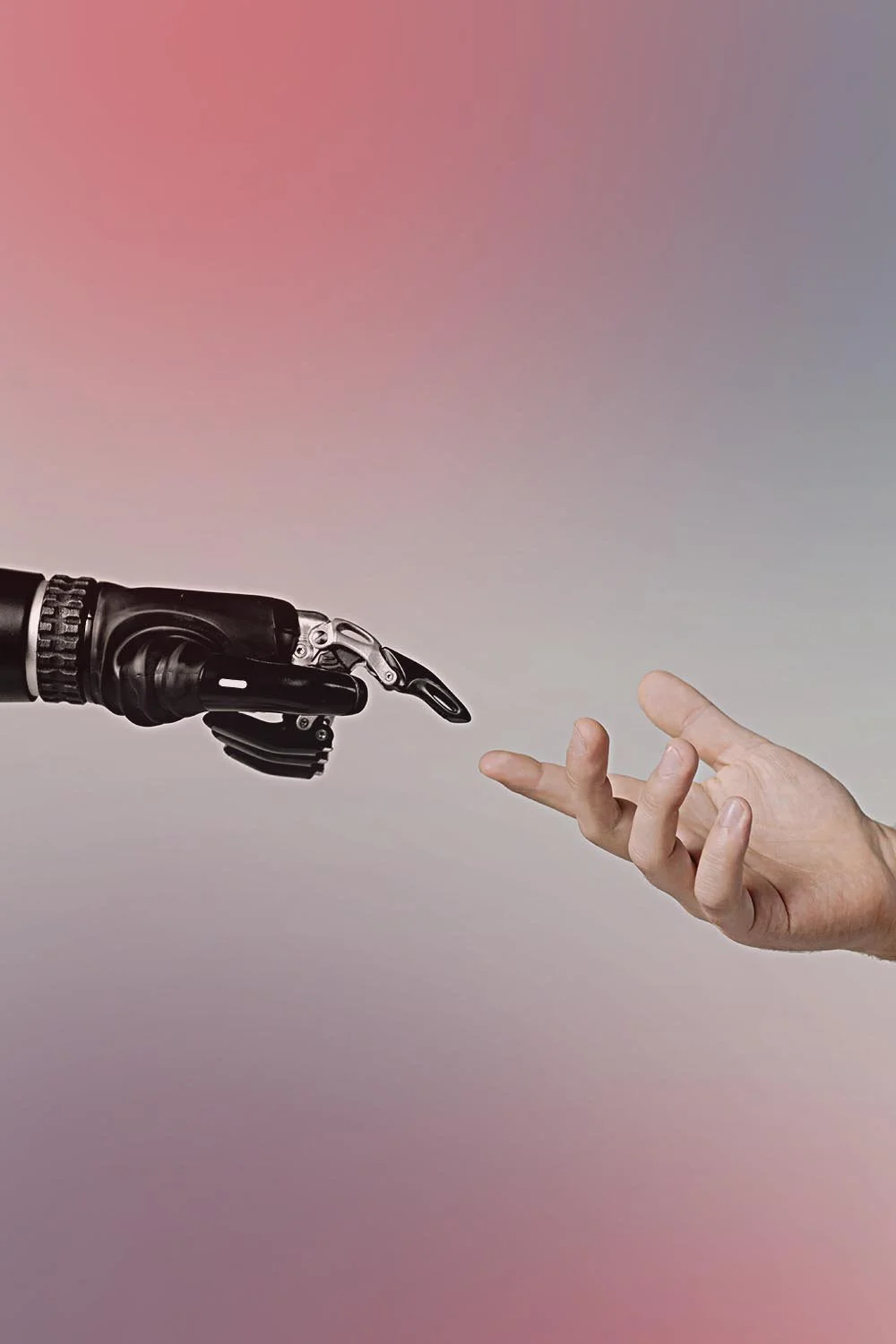 Robot hand with pointed finger reaching out toward a human hand in order to make meaningful contact