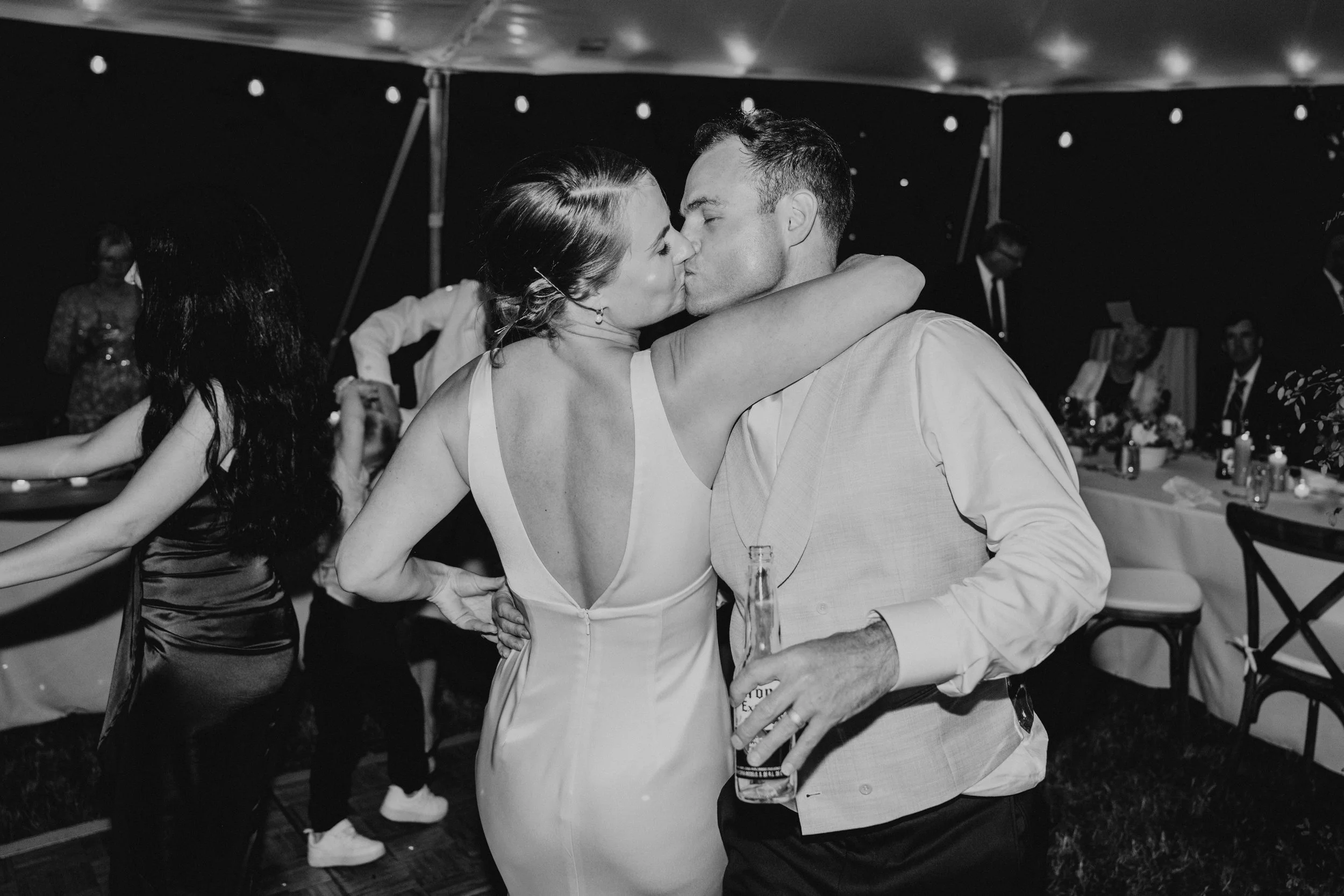 Bride and groom kissing on the dance floor at the Hastings House on Salt Spring Island 
