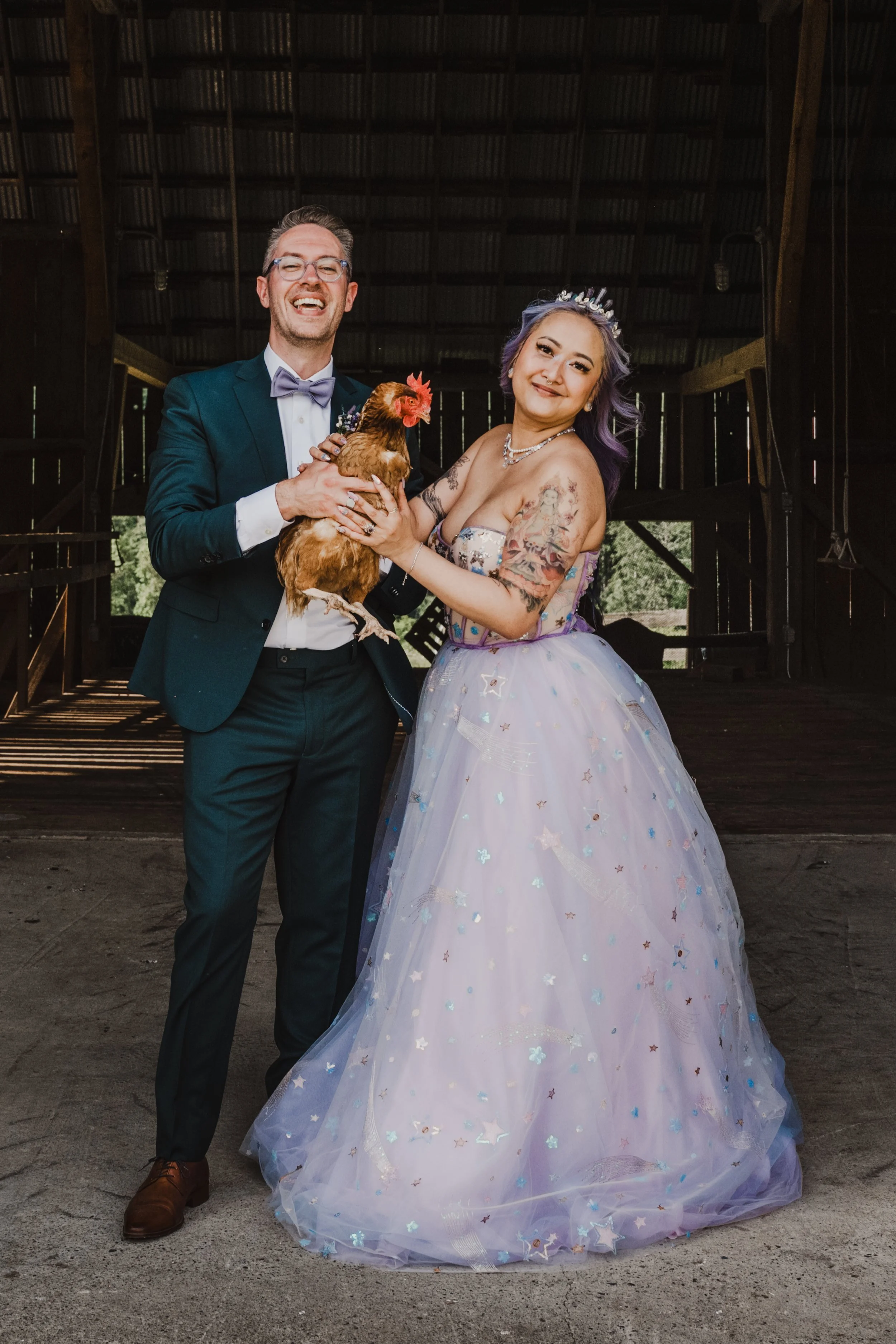 bride and groom with a chicken, on Vancouver Island
