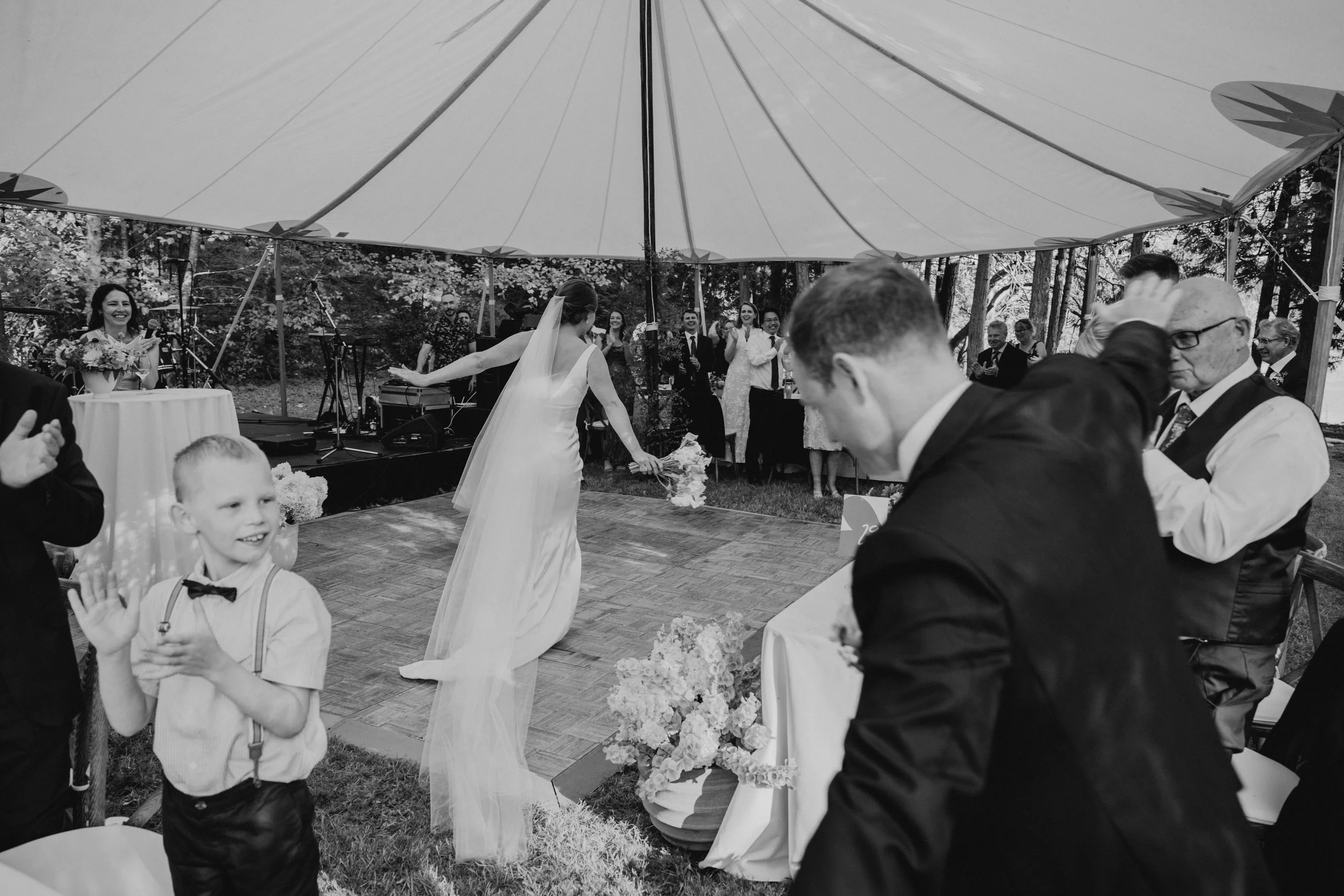 Bride and groom dancing into dinner at Hastings House on Salt Spring Island 