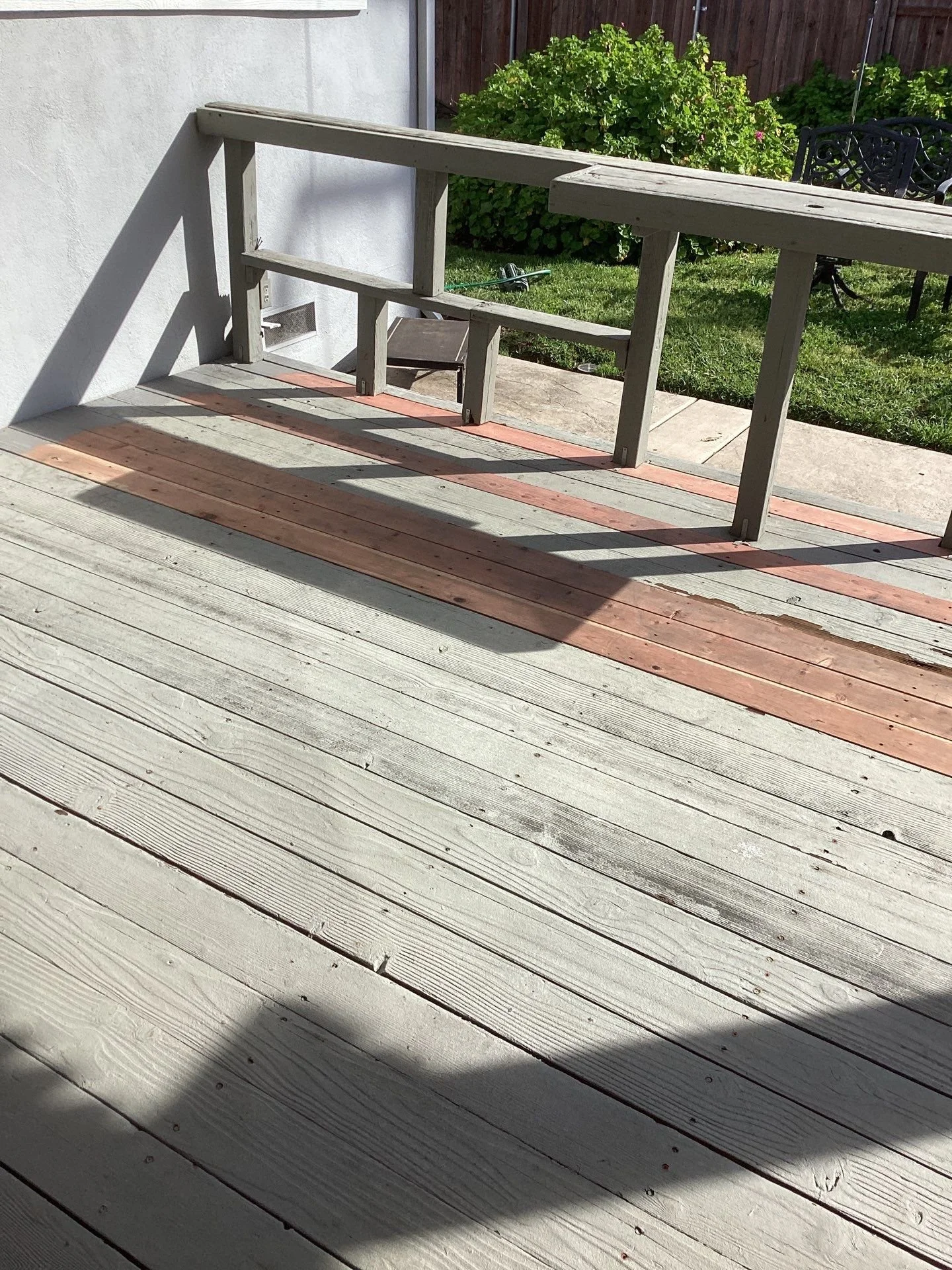 New deck boards installed by the railing during deck repair in Rio Linda