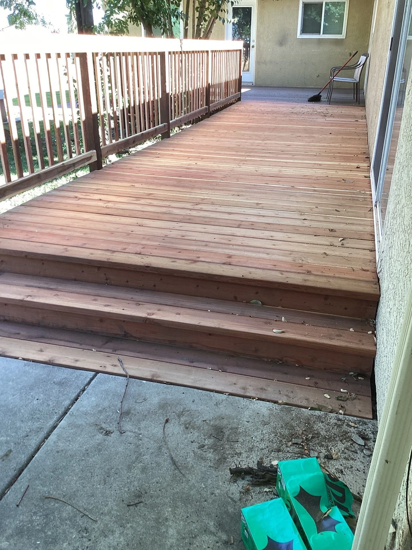 Finished deck and new steps after deck rebuild in Sacramento