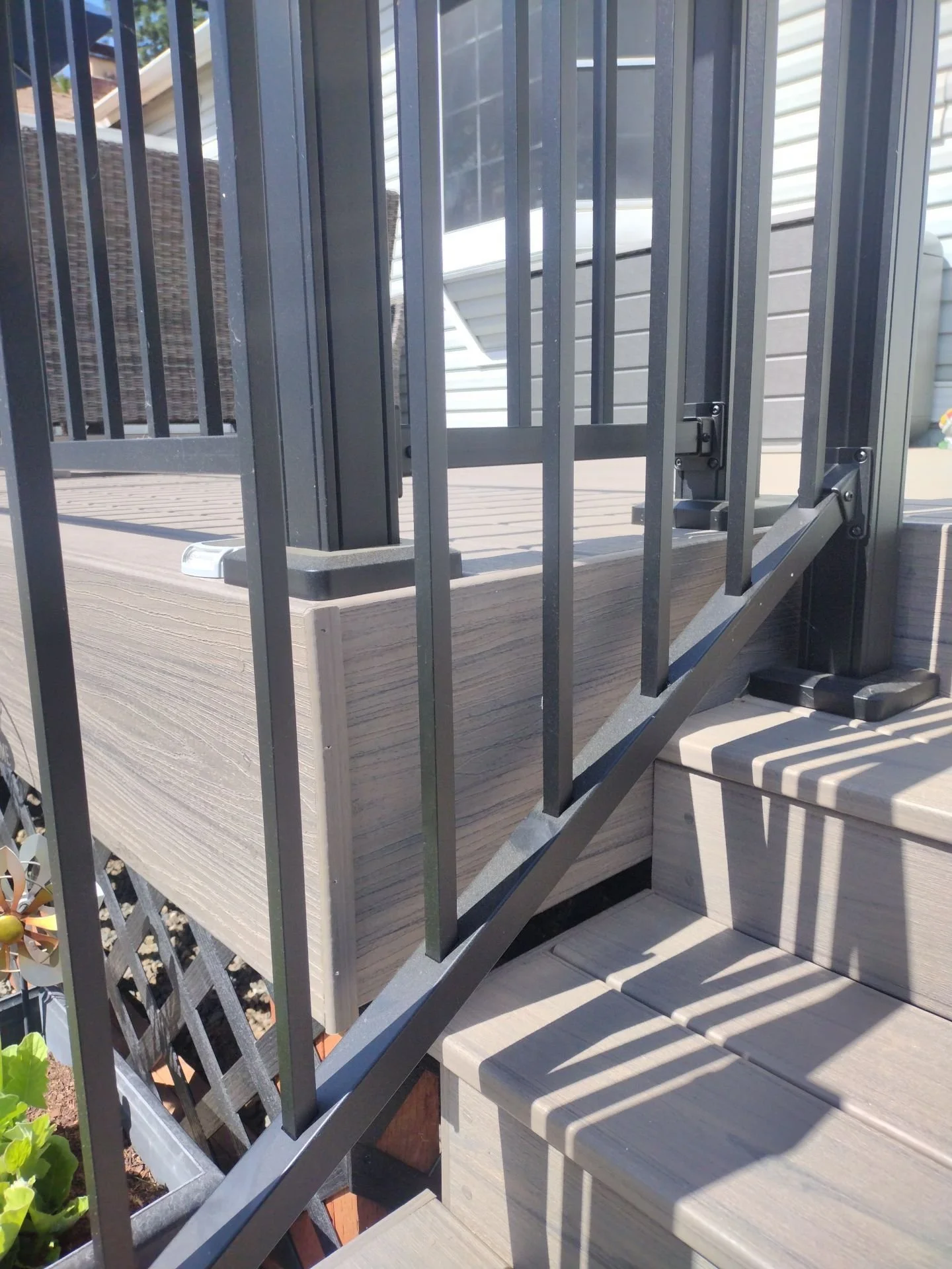 Composite deck railing and stair detail on a new deck in Rio Linda