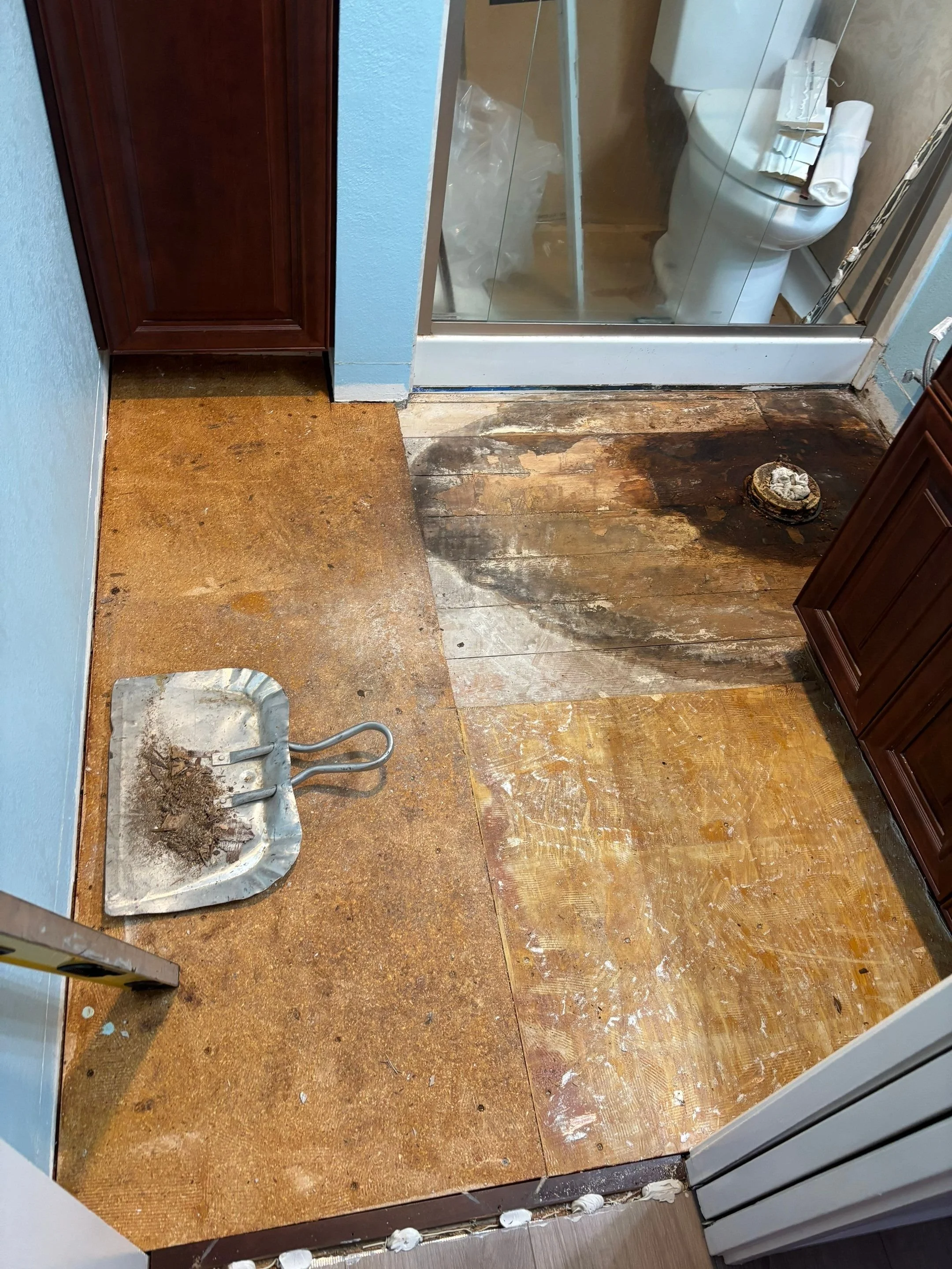 Rotted bathroom subfloor exposed before repair in Sacramento