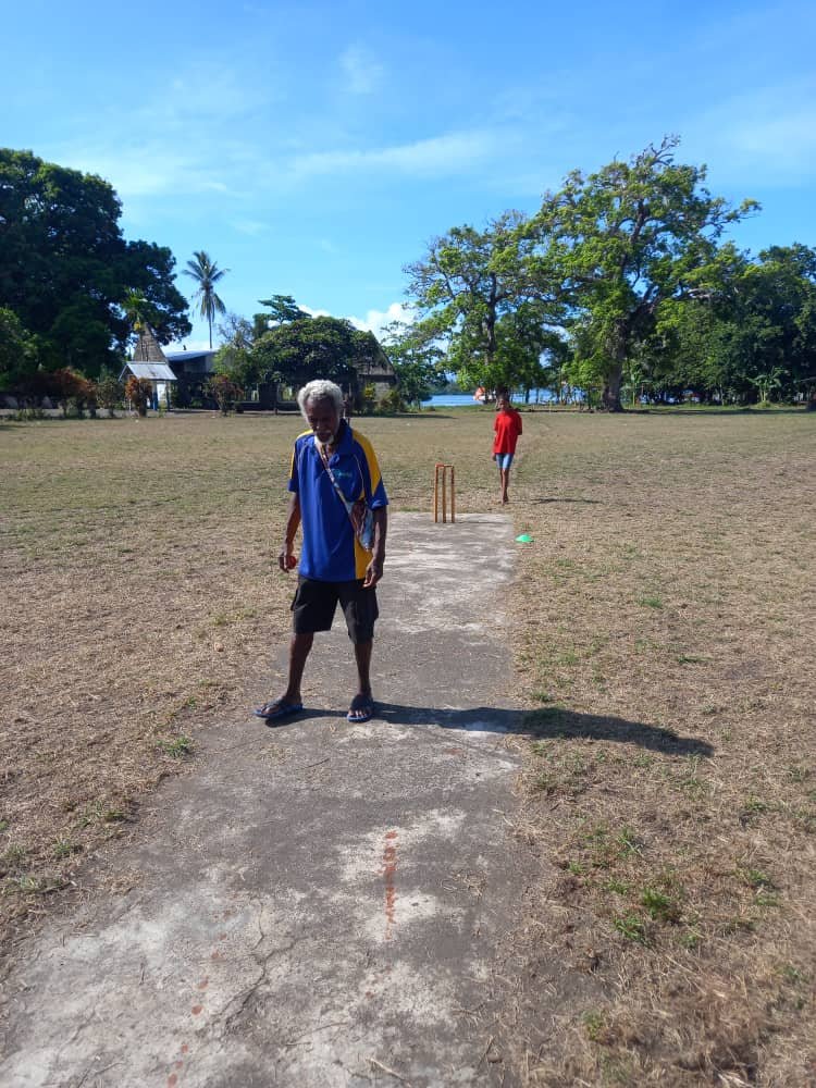 Day3 Malolo, pitch inspection by one  of  the elders to continue games in Ahioma.jpg