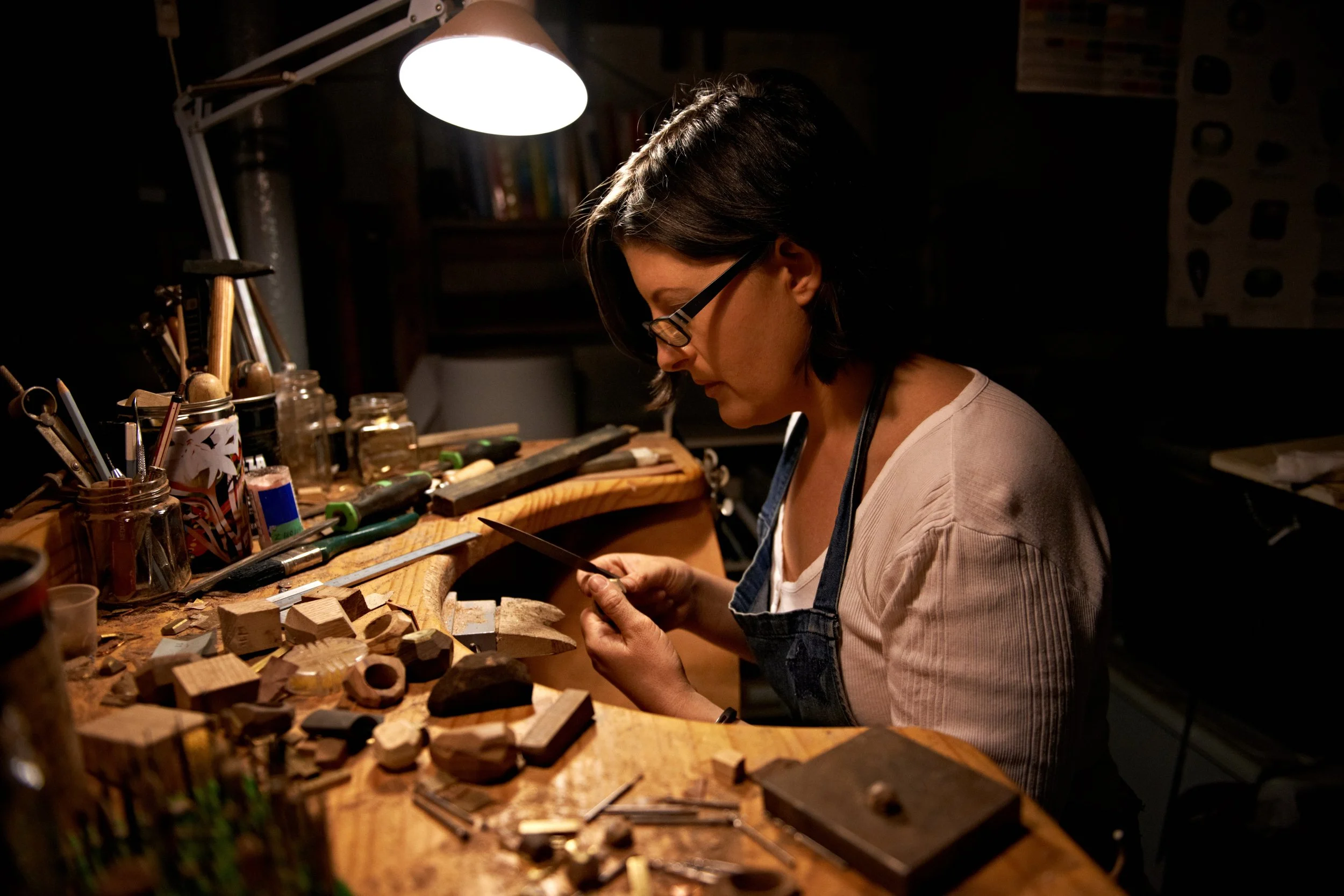 jeweler fixing a necklace