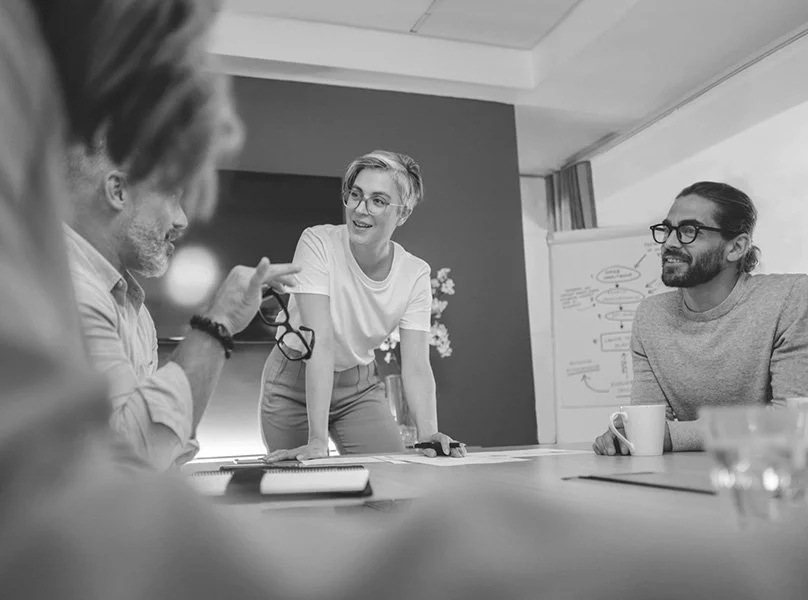 Team of strategists planning the next customer journey for a client