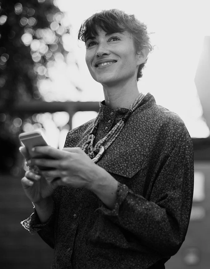 Happy new client imagining peace of mind they will receive from having a business/ brand strategy in use