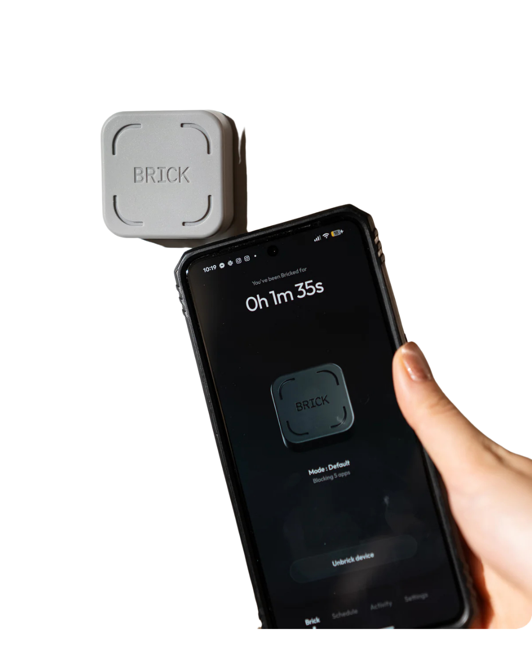 Brick phone-blocking device used to limit access to distracting apps.