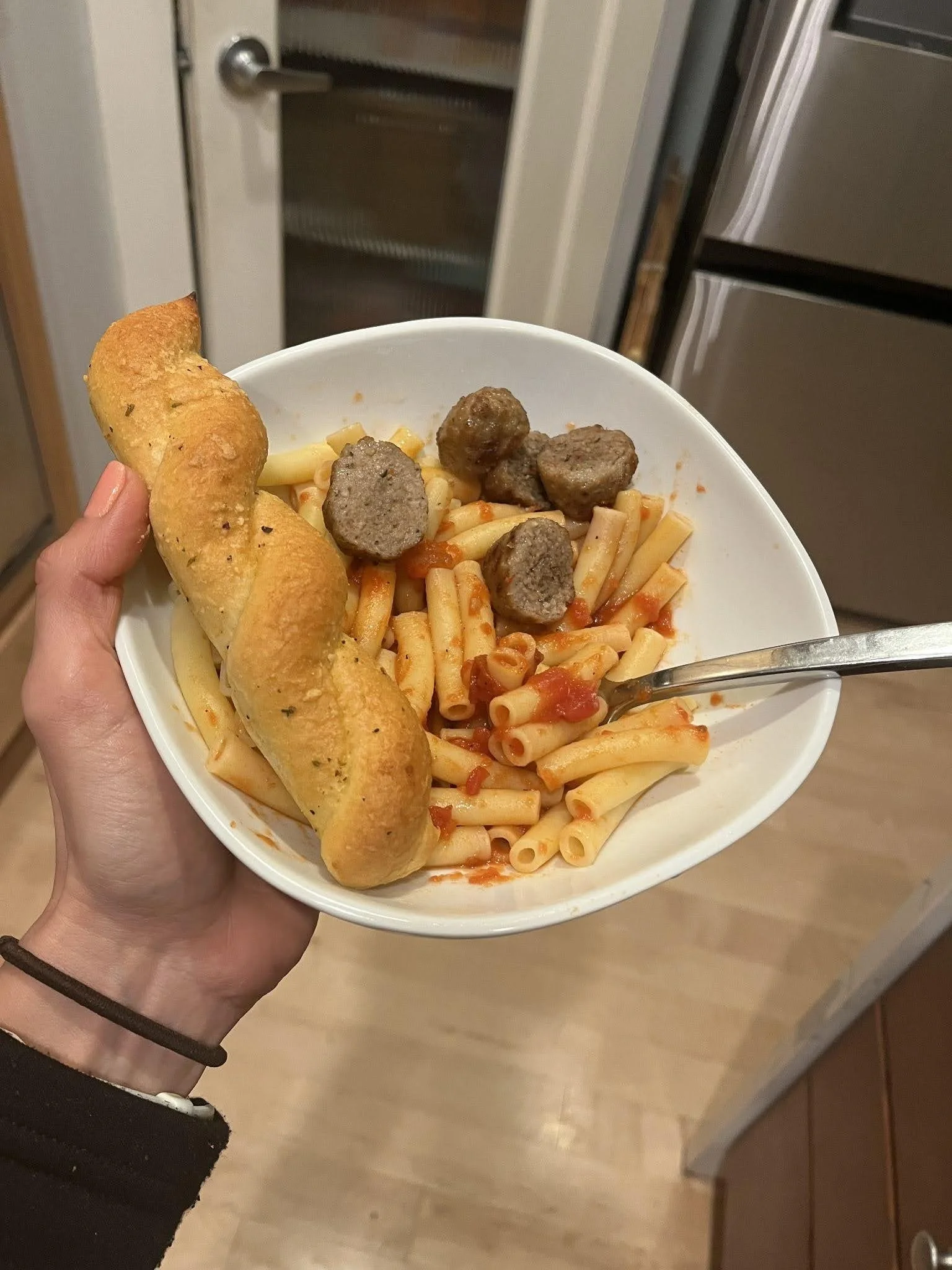 Pasta with meatballs and a breadstick — an example of carb loading for marathon race week