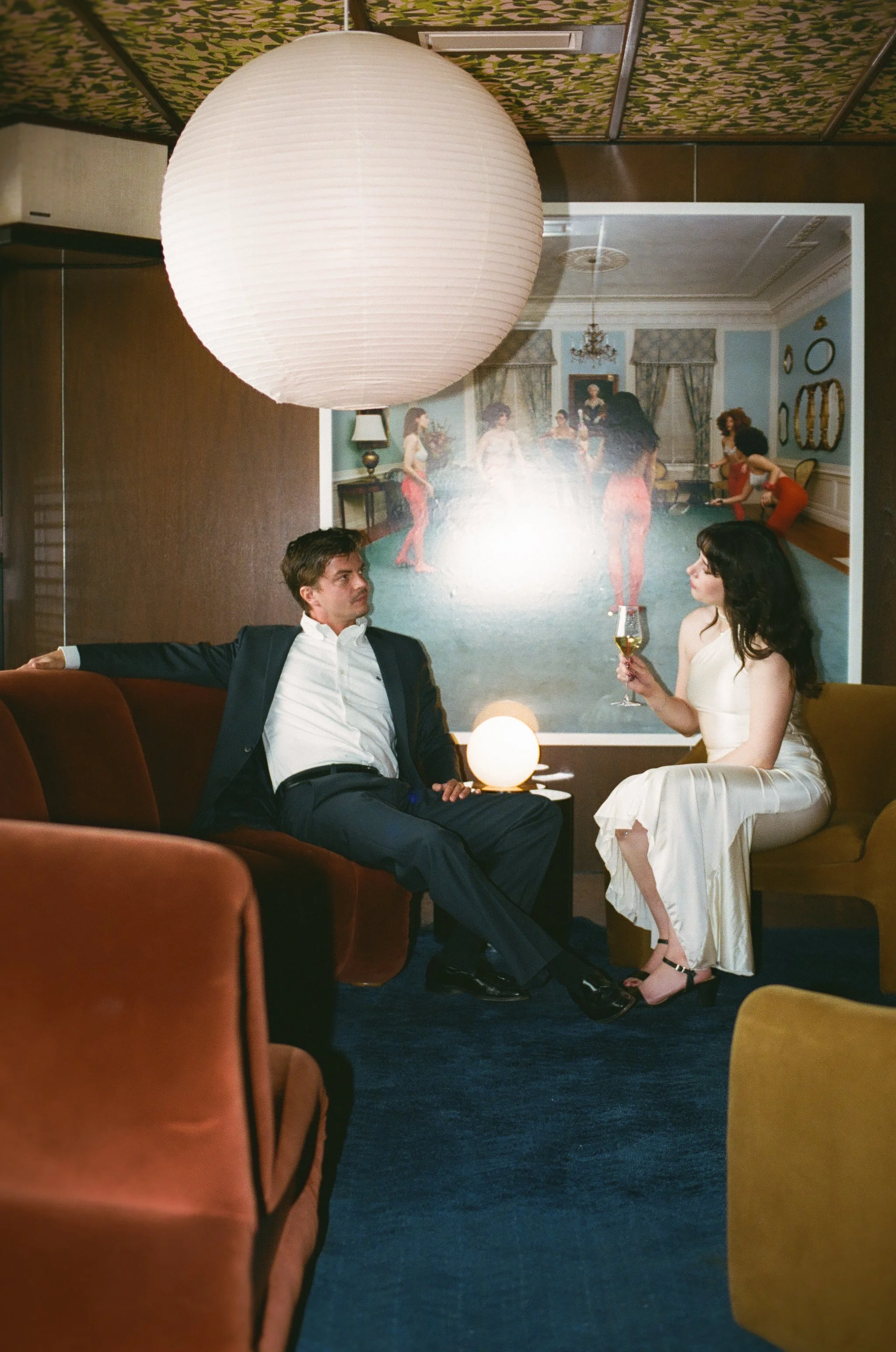 editorial 70s inspired bar engagement photos
