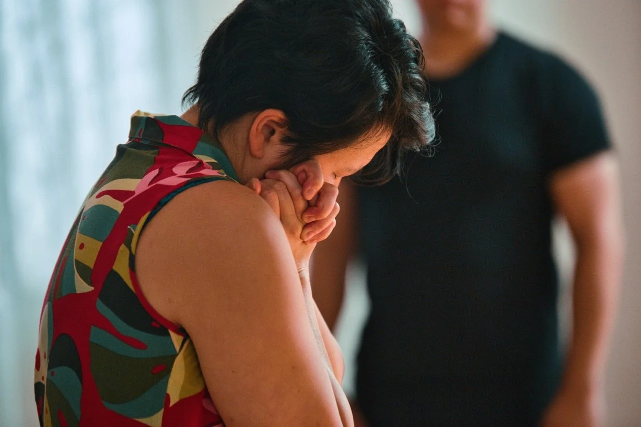 Jean Sum expressing herself through movement with her eyes closed.