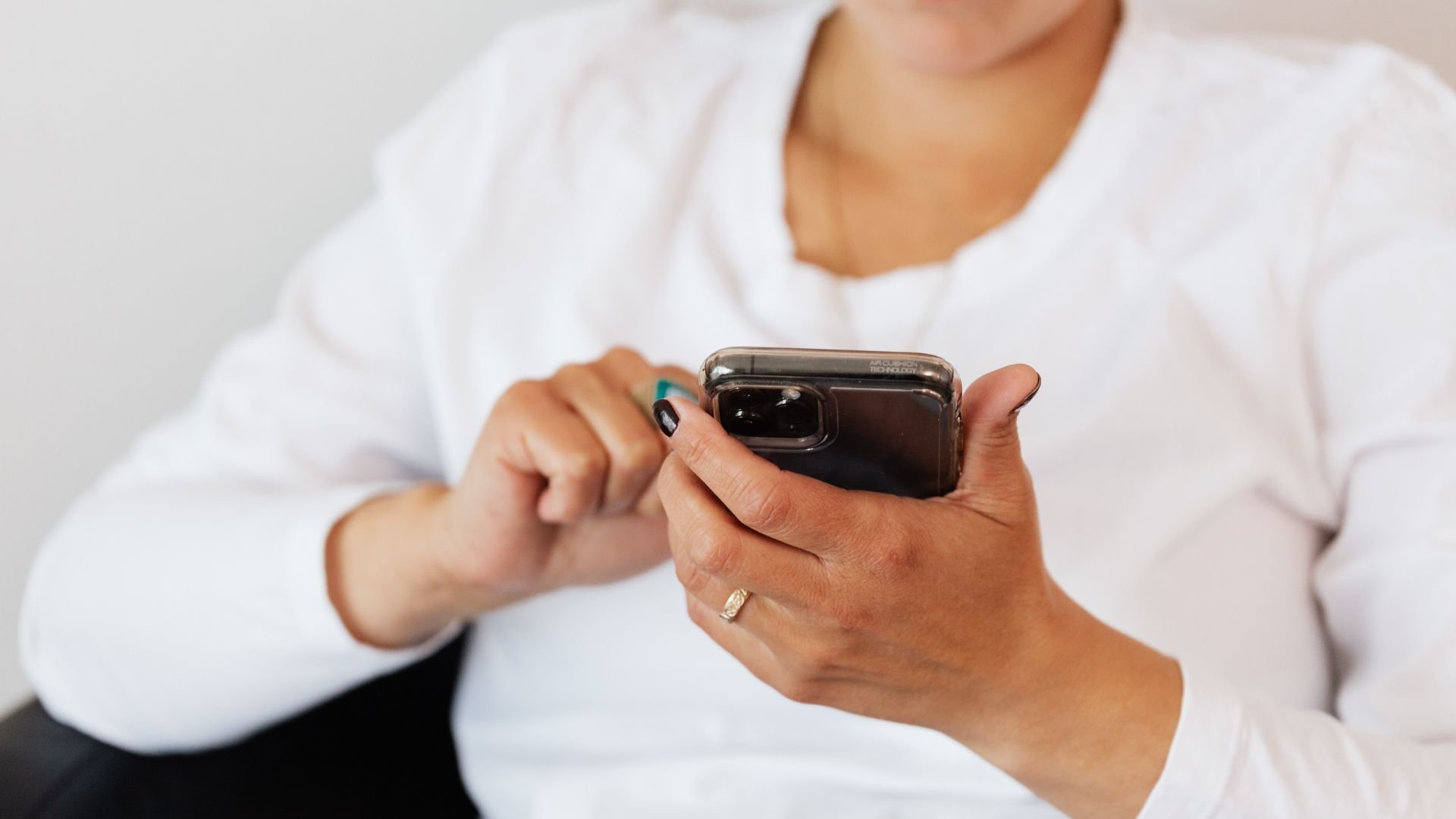 Image of a woman using a smartphone