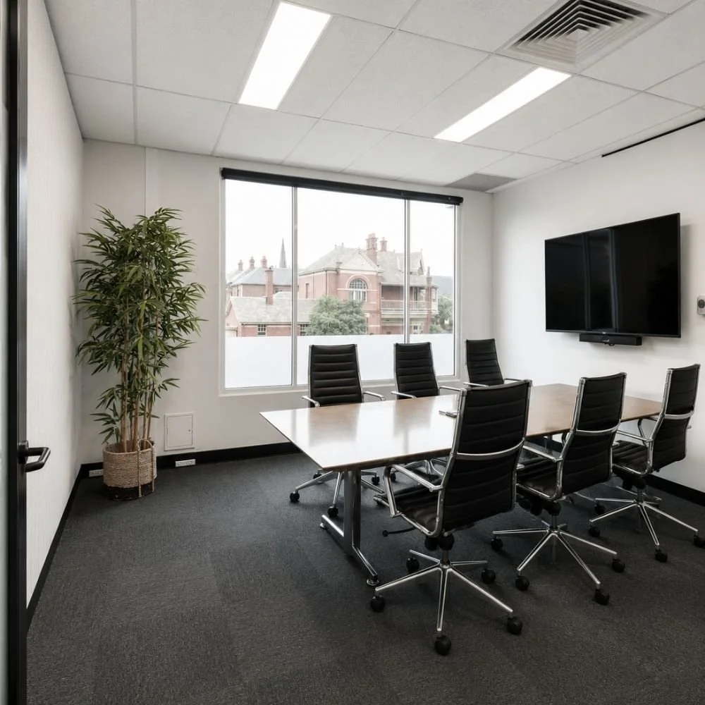 Black office swivel chair, oak meeting table