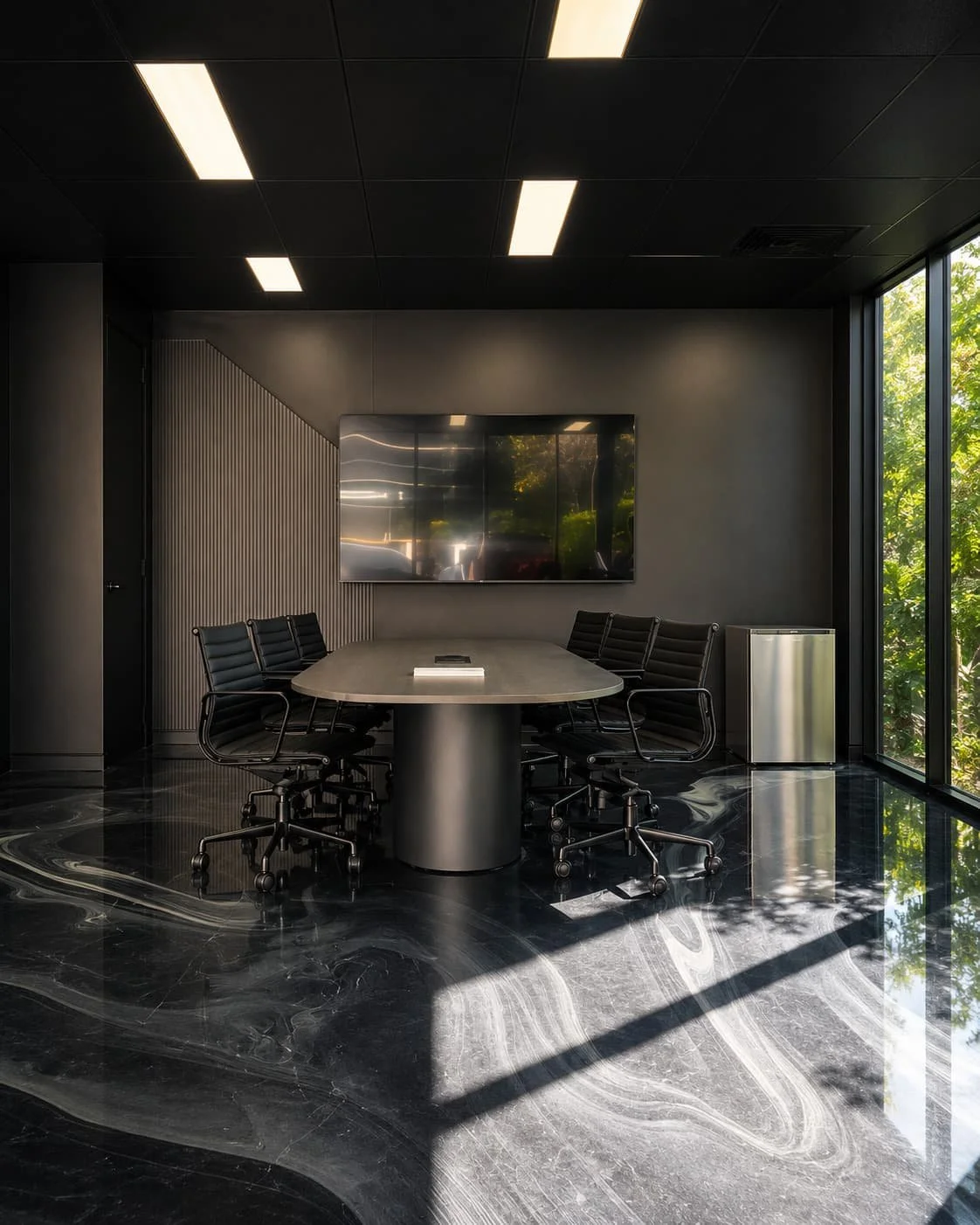 Black drum base meeting table with black eames meeting swivel base chairs