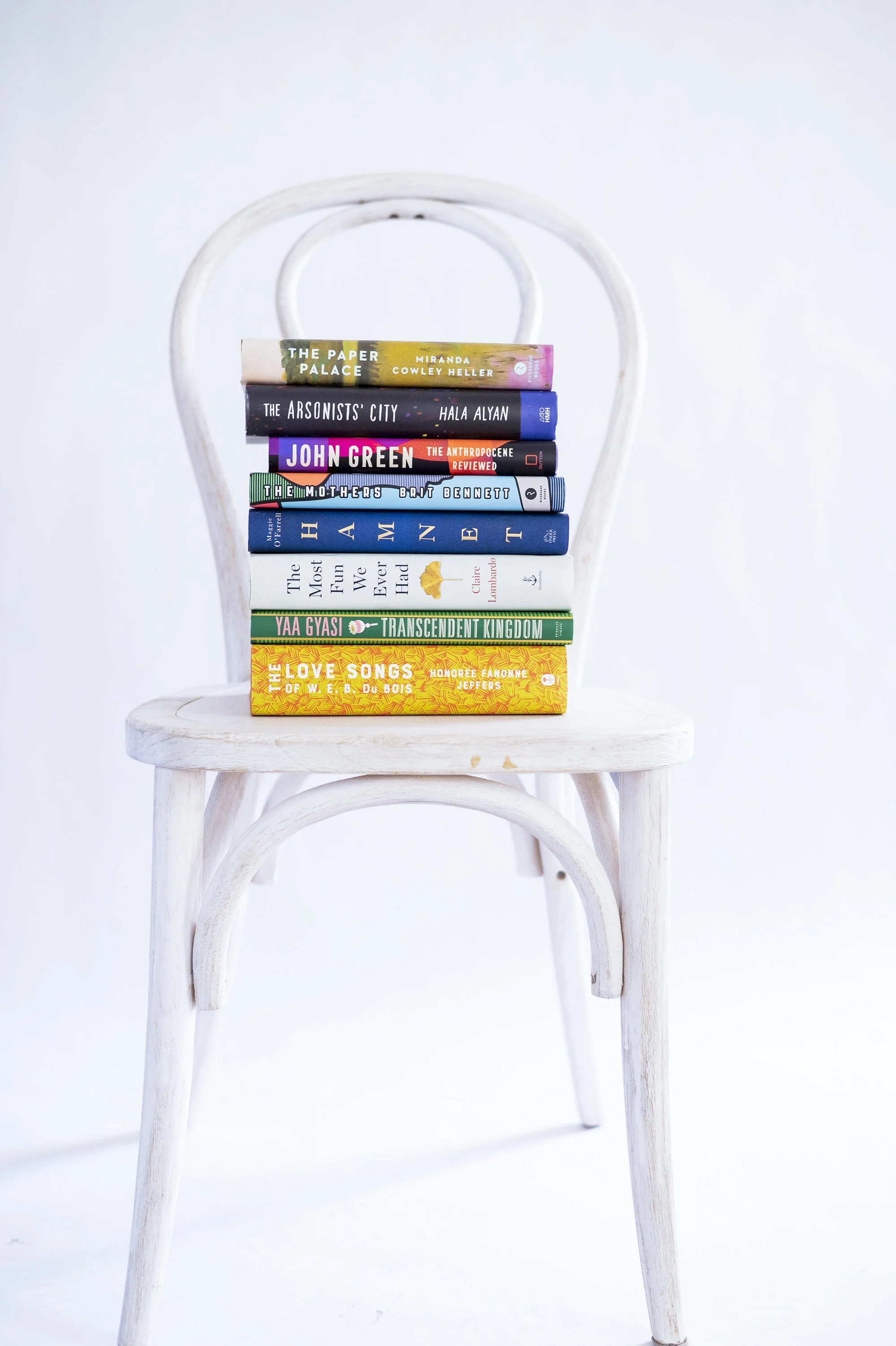 book stack on chair small.jpg