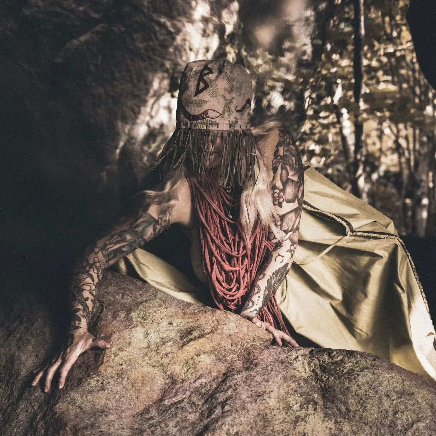 She of the North

She knows
there is knowledge sleeping in the stones.

She feels it
vibrating beneath the roots,
between moss and soil,
inside the old trees.

She senses the ones
who still dare to sing
the old songs.

She is one
and she is many.

Sh