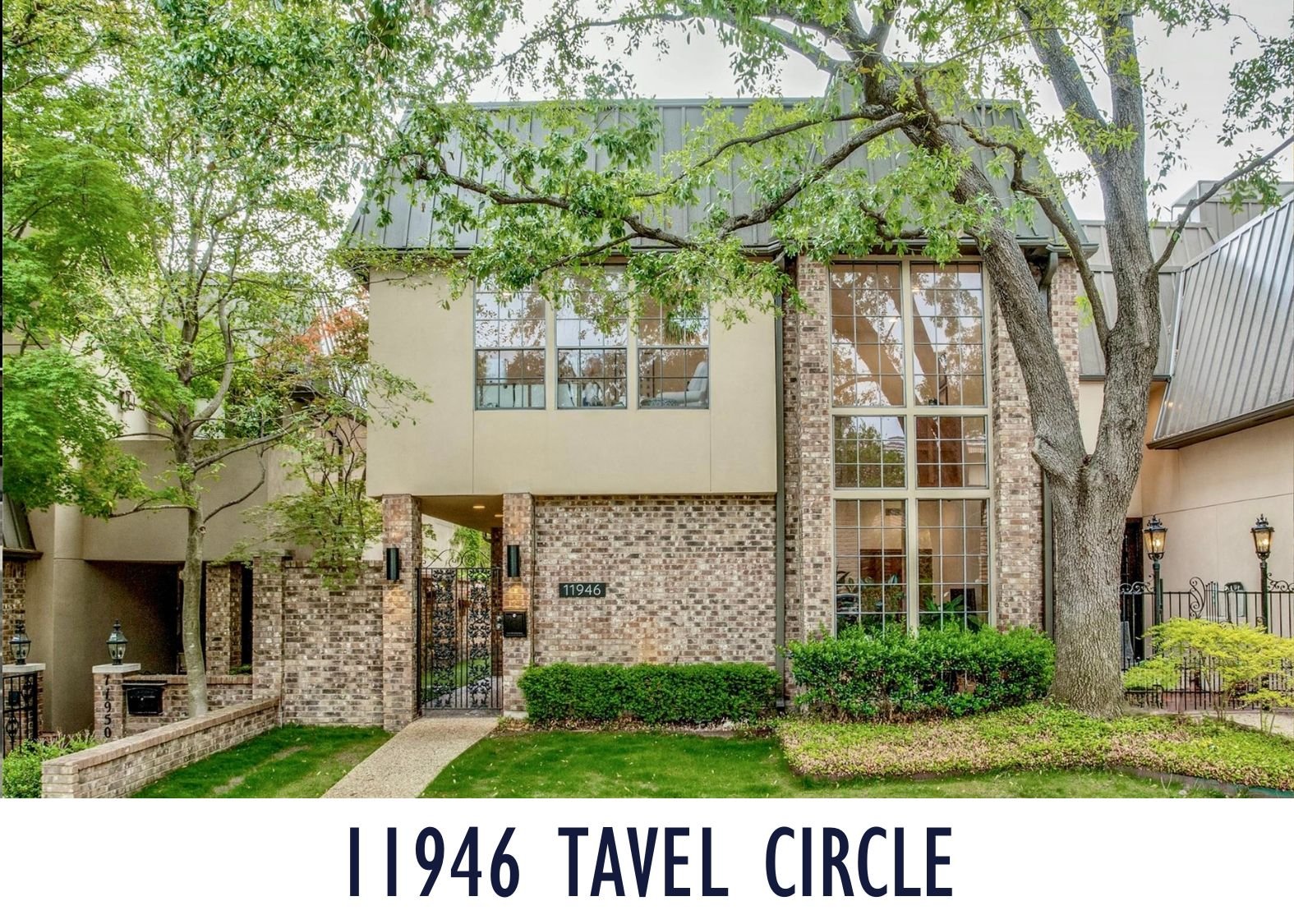 A modern house with brick and beige walls, large windows, surrounded by green trees and neatly trimmed bushes, with a gated entrance, and the address 11946 Tavel Circle displayed at the bottom.