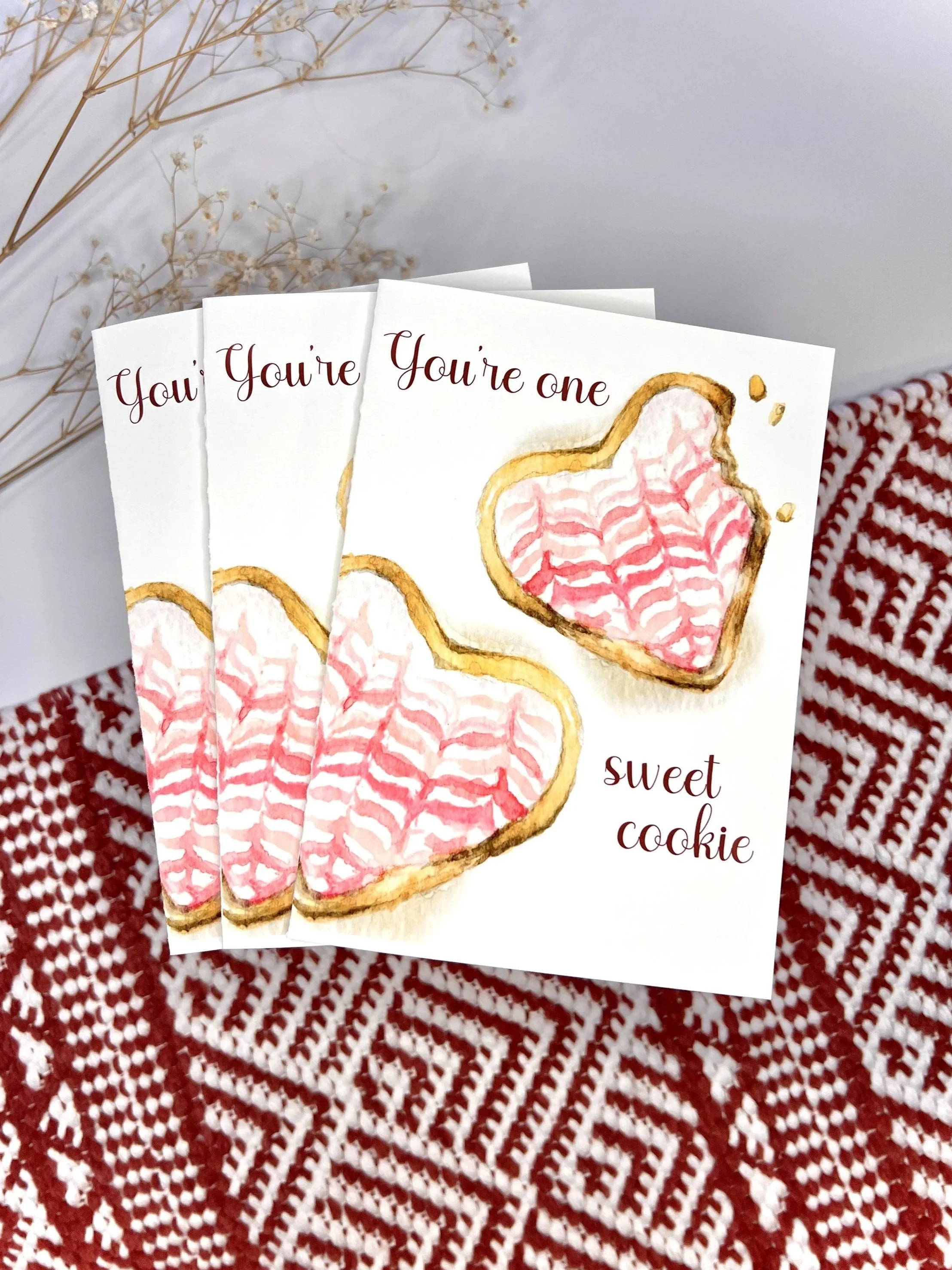 Multiple watercolor Valentine Cookie cards with the words, "You're one sweet cookie"