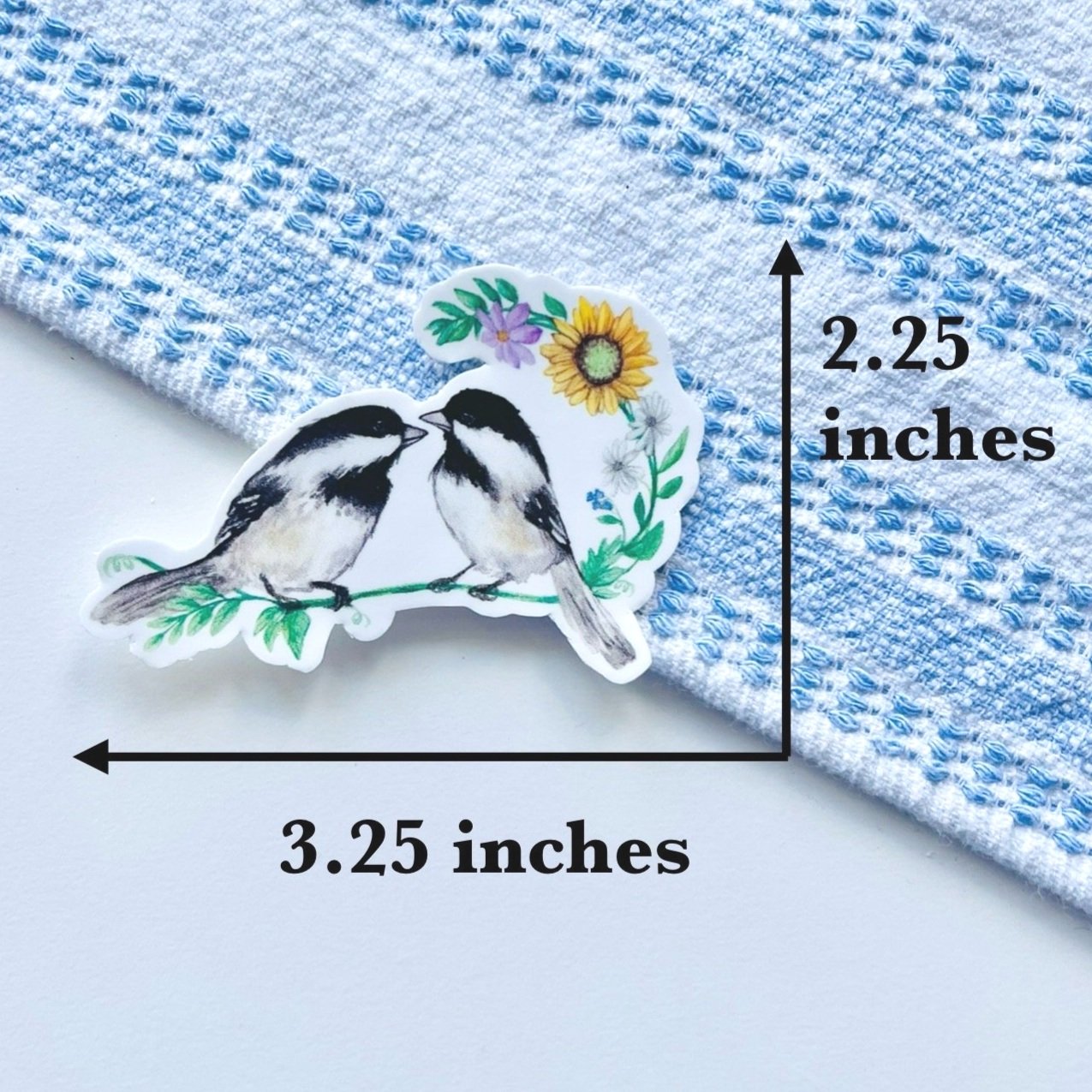 Watercolor Chickadees sitting on a floral branch sticker size - 3.25 X 2.25 inches