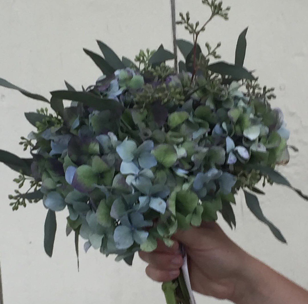 Simple bridesmaid single stem bouquet.jpg