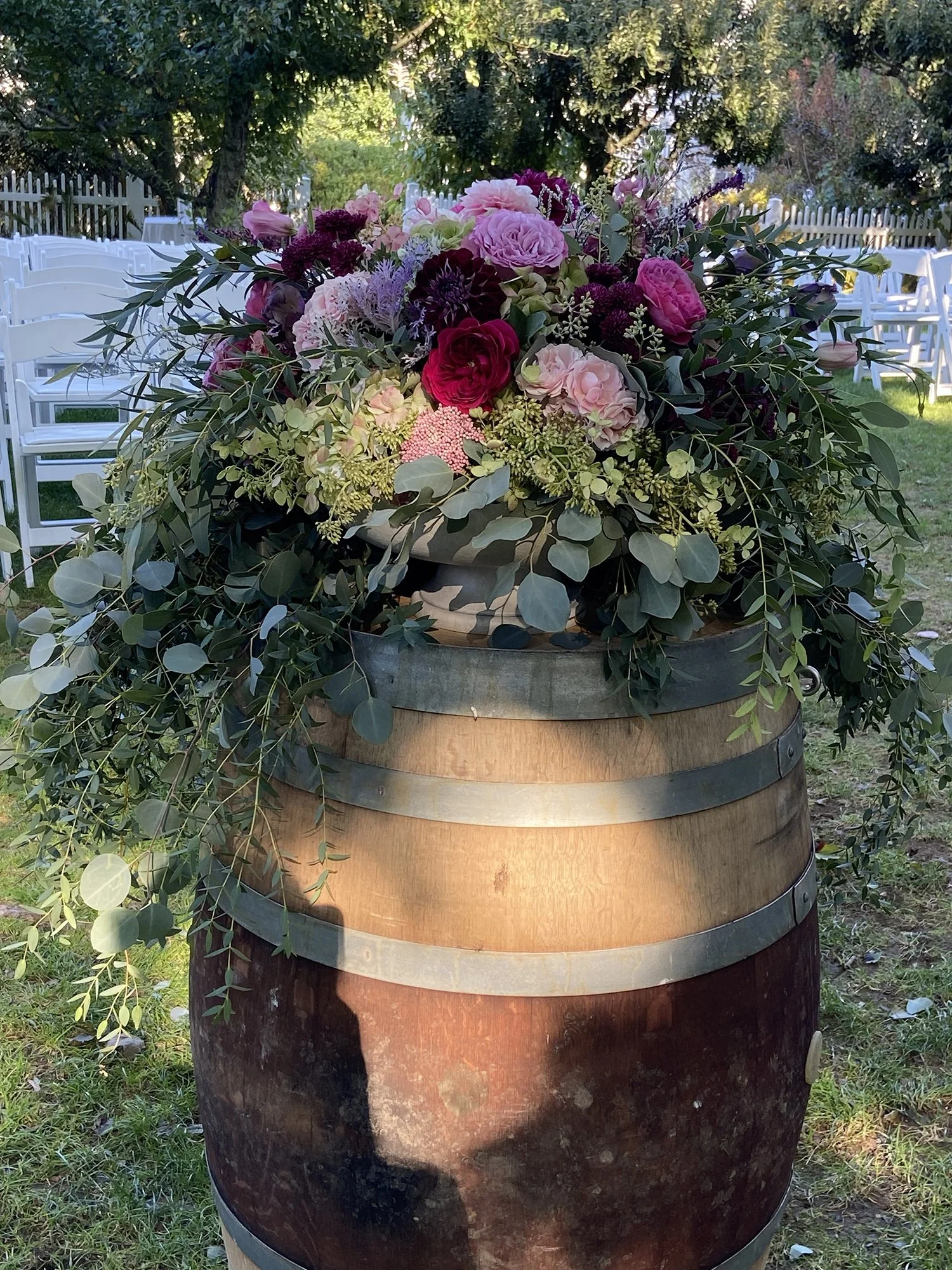 Wine barrel ceremony florals.jpg