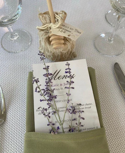 Napkin sprigs at each guest place setting.jpg