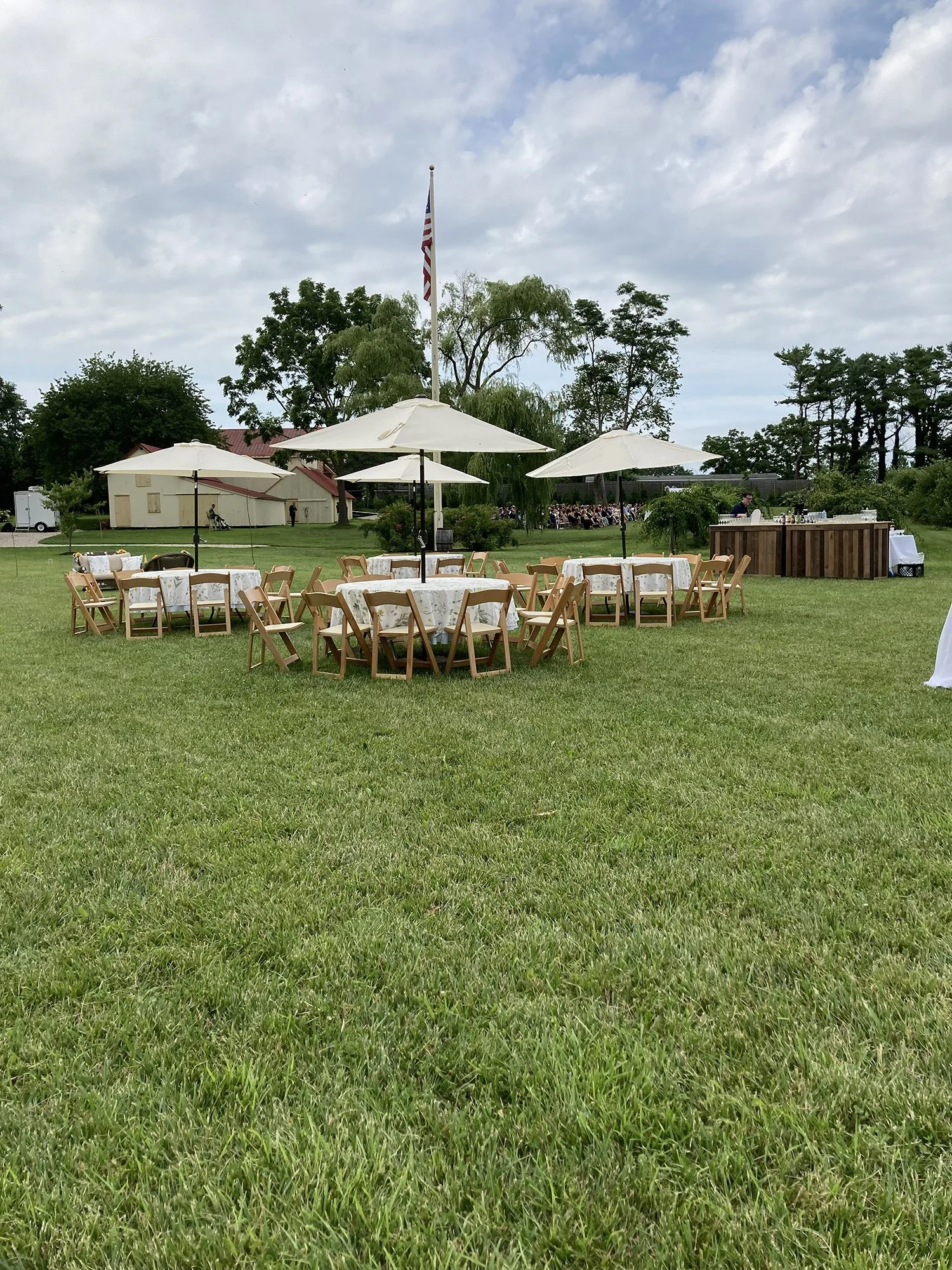 An umbrella cocktail hour set-up at Salt Air Farm.jpg