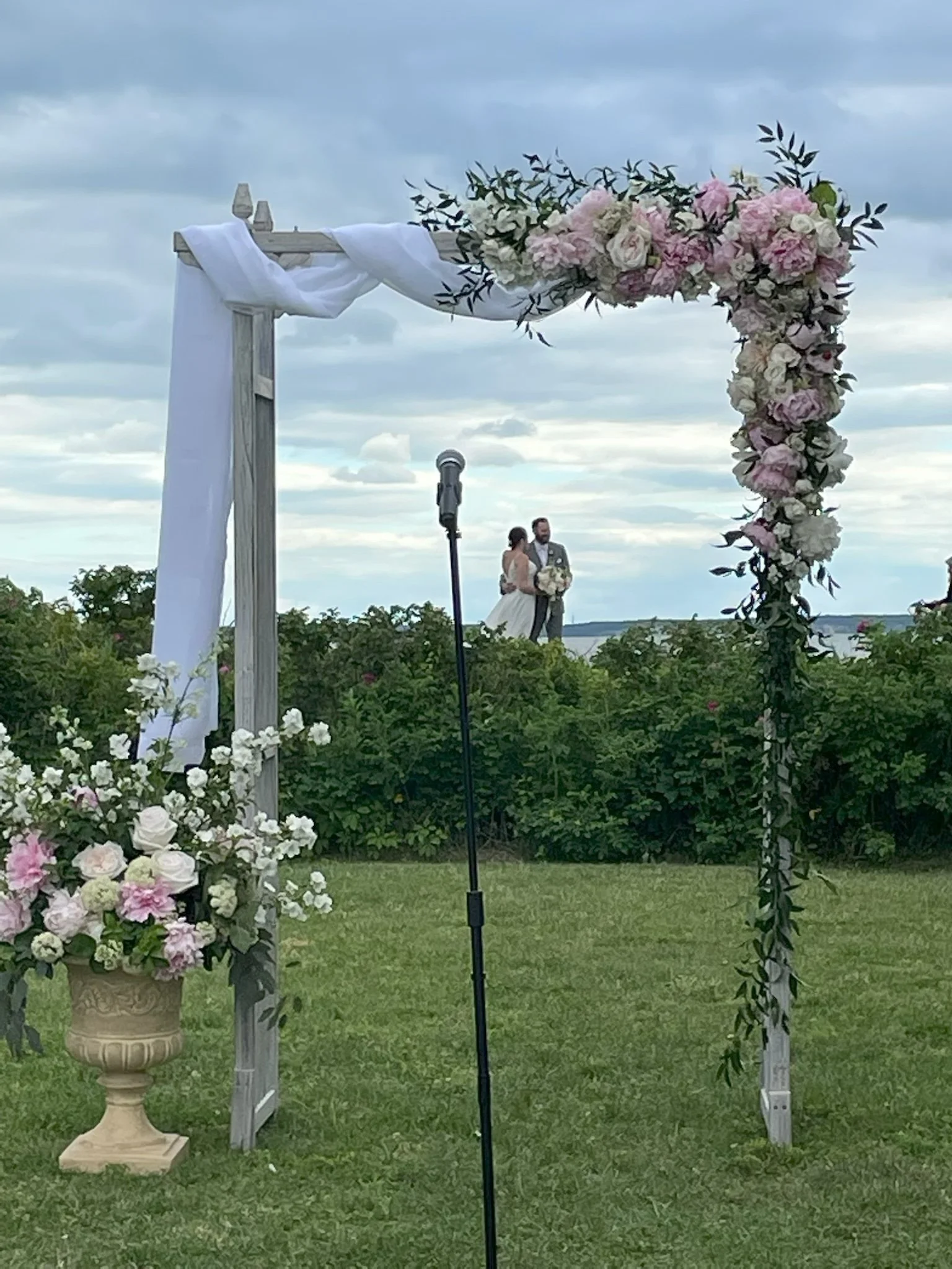 Garden arch with floral urn.jpg