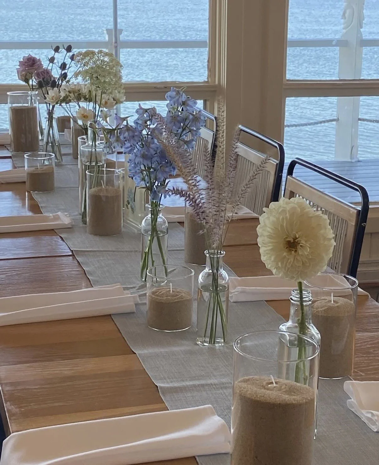 Sand votives and bottle vases.jpg