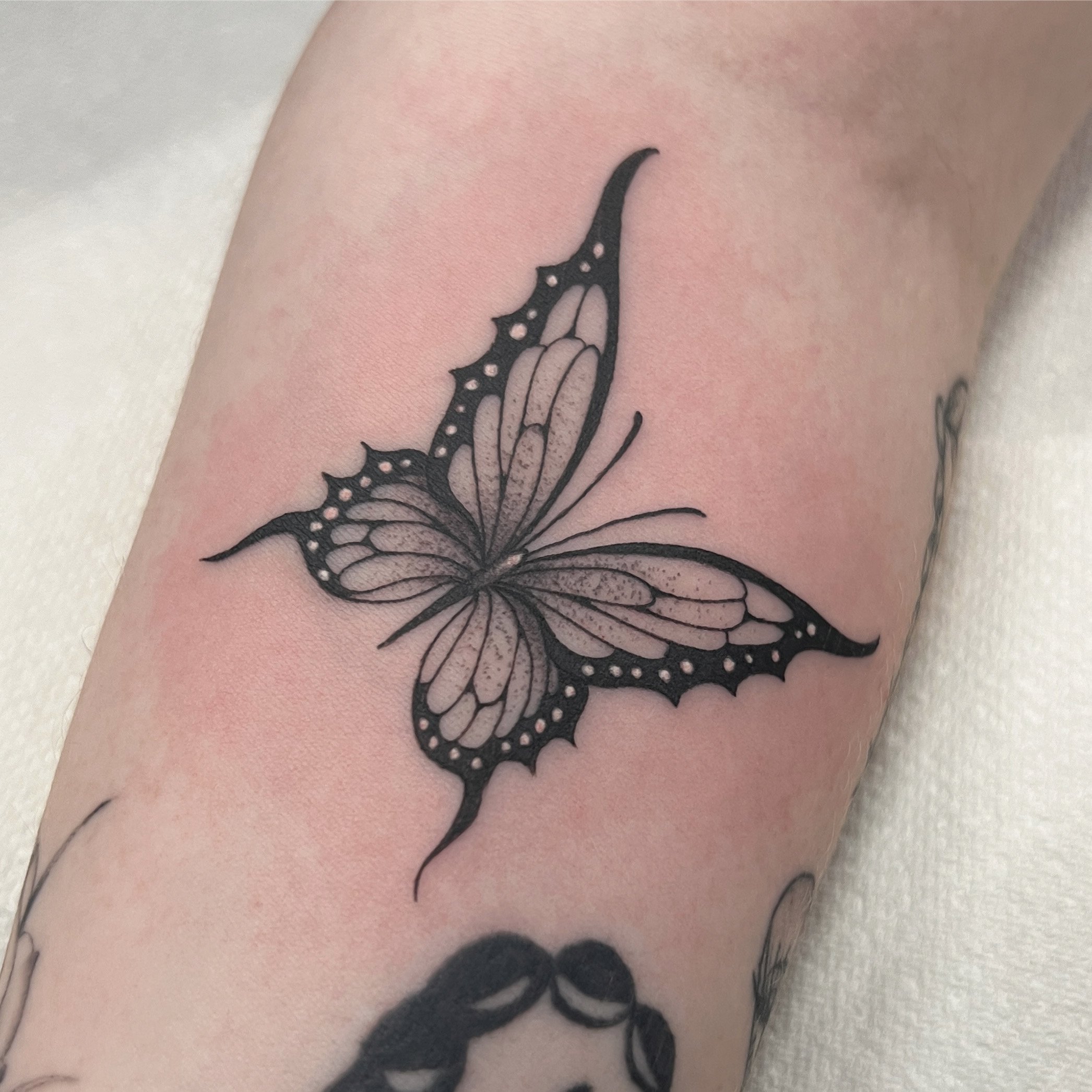 Fineline butterfly black and grey tattoo