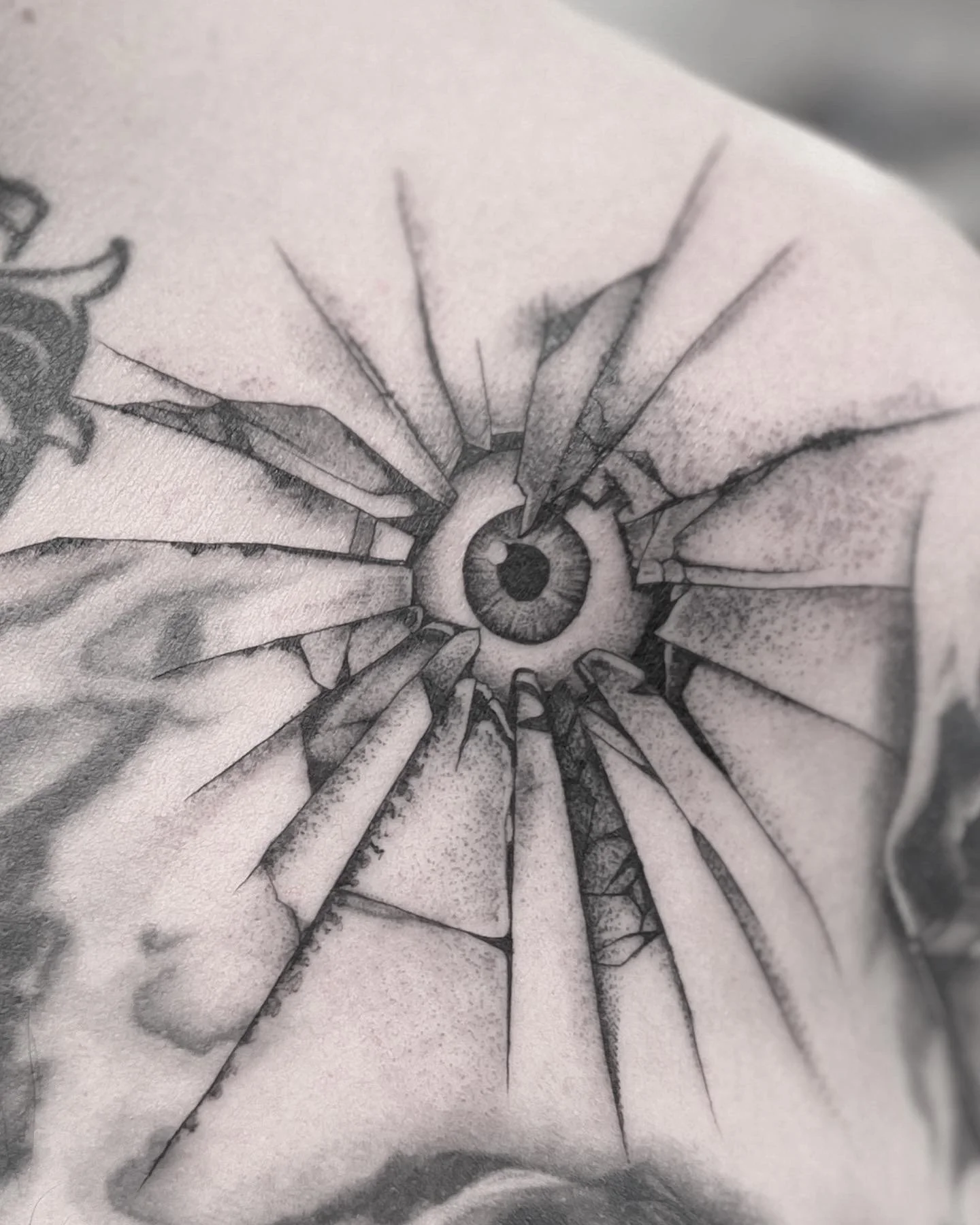 Eye ball shattered glass tattoo