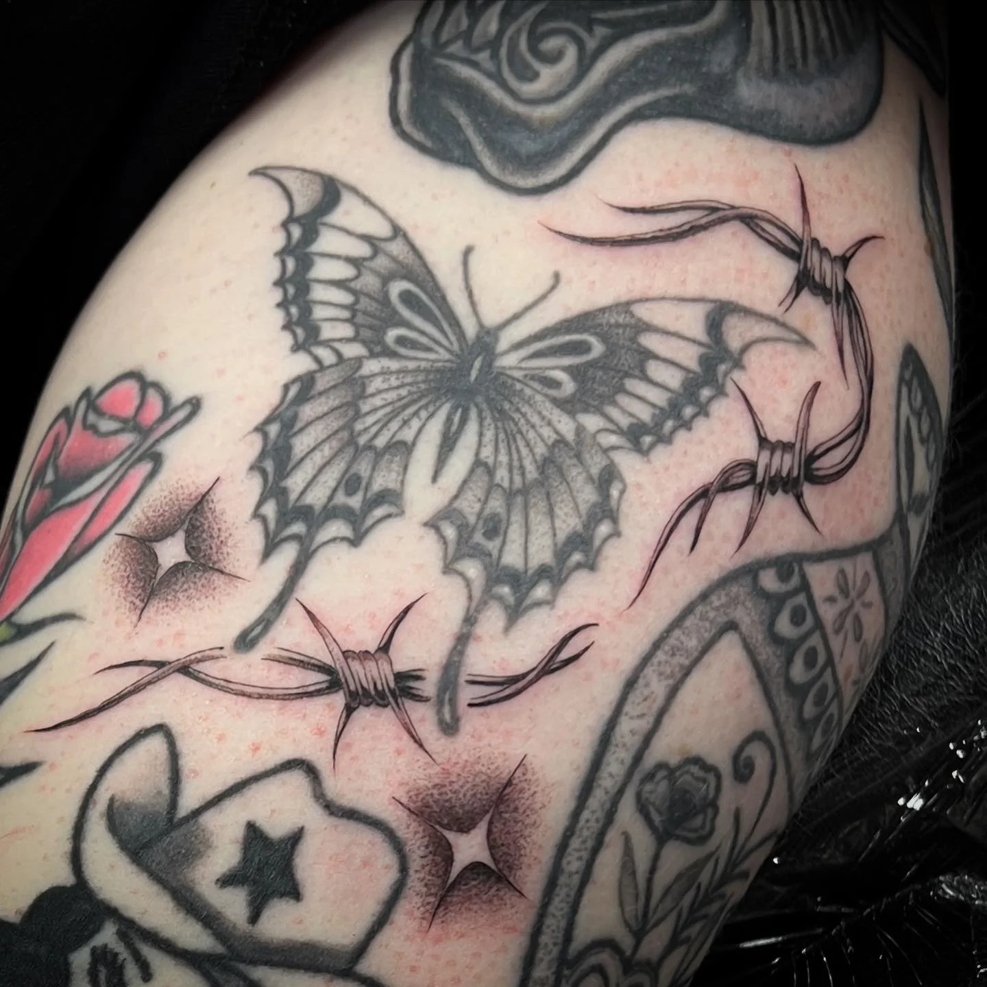 Butterfly barbed wire black and grey tattoo
